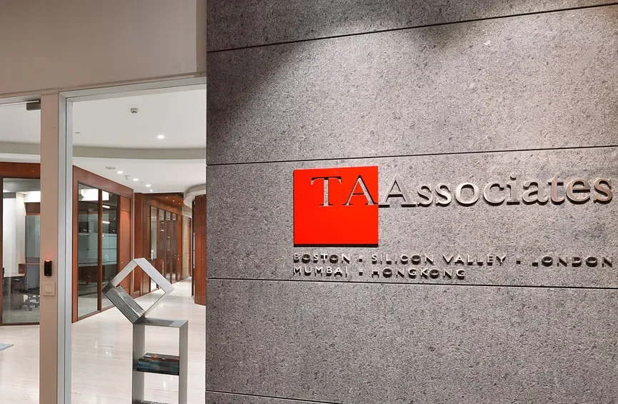 A smiling man in a suit