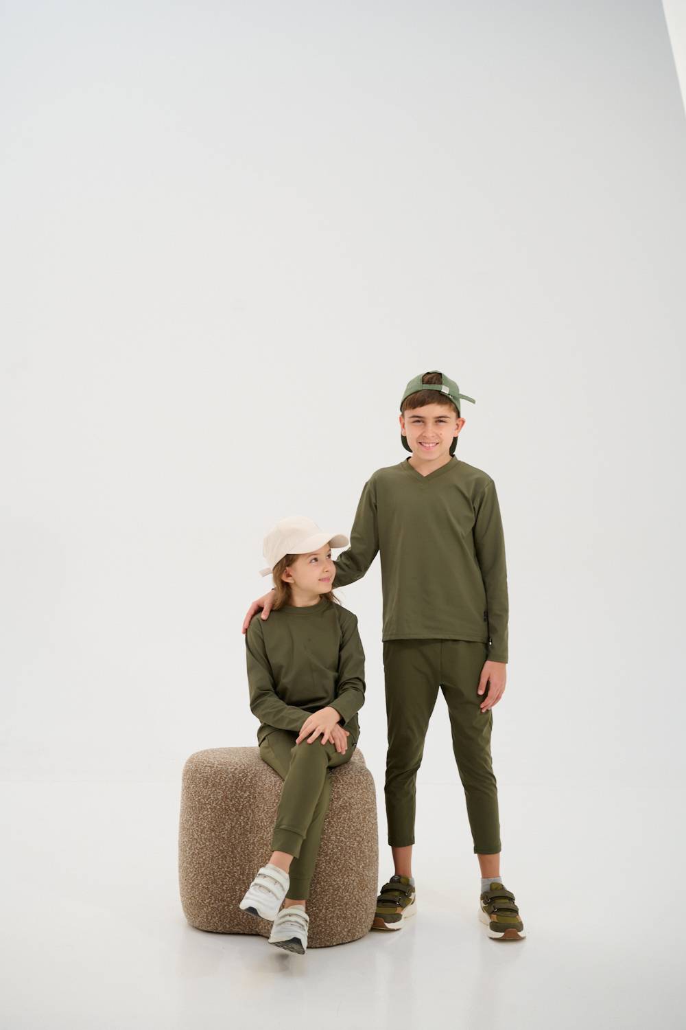 Friends laughing and posing inside a car