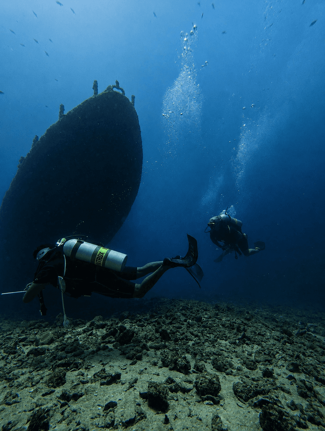 Divers exploring the Underwater Navy Museum wreck site in Trincomalee