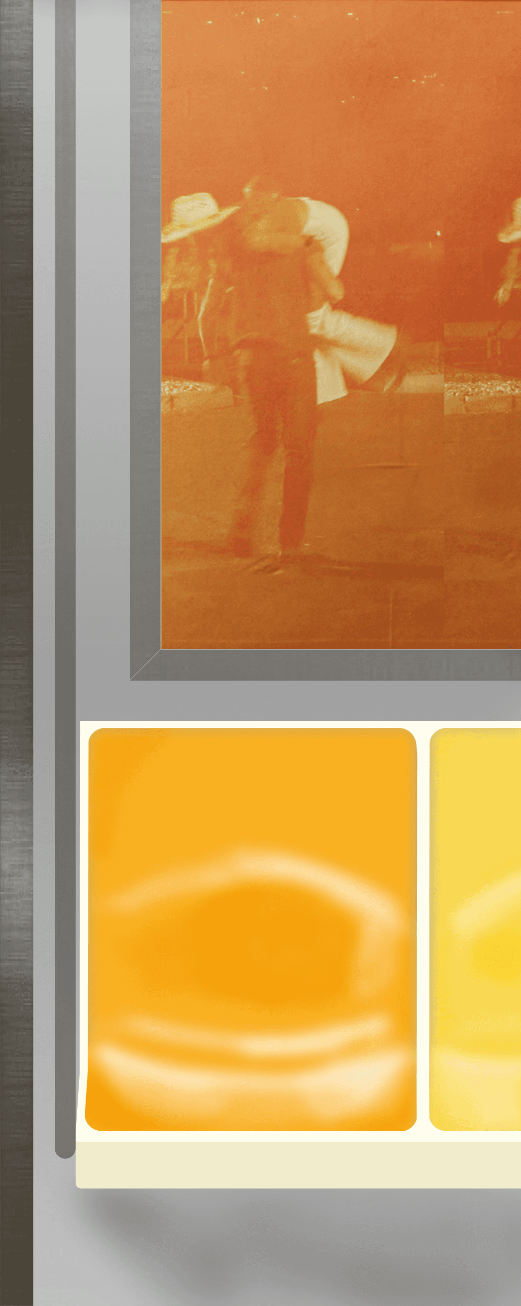 right side of a subway car with an ad for via and orange seats