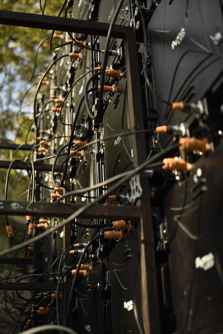 Rows of black LED panels connected by wires.