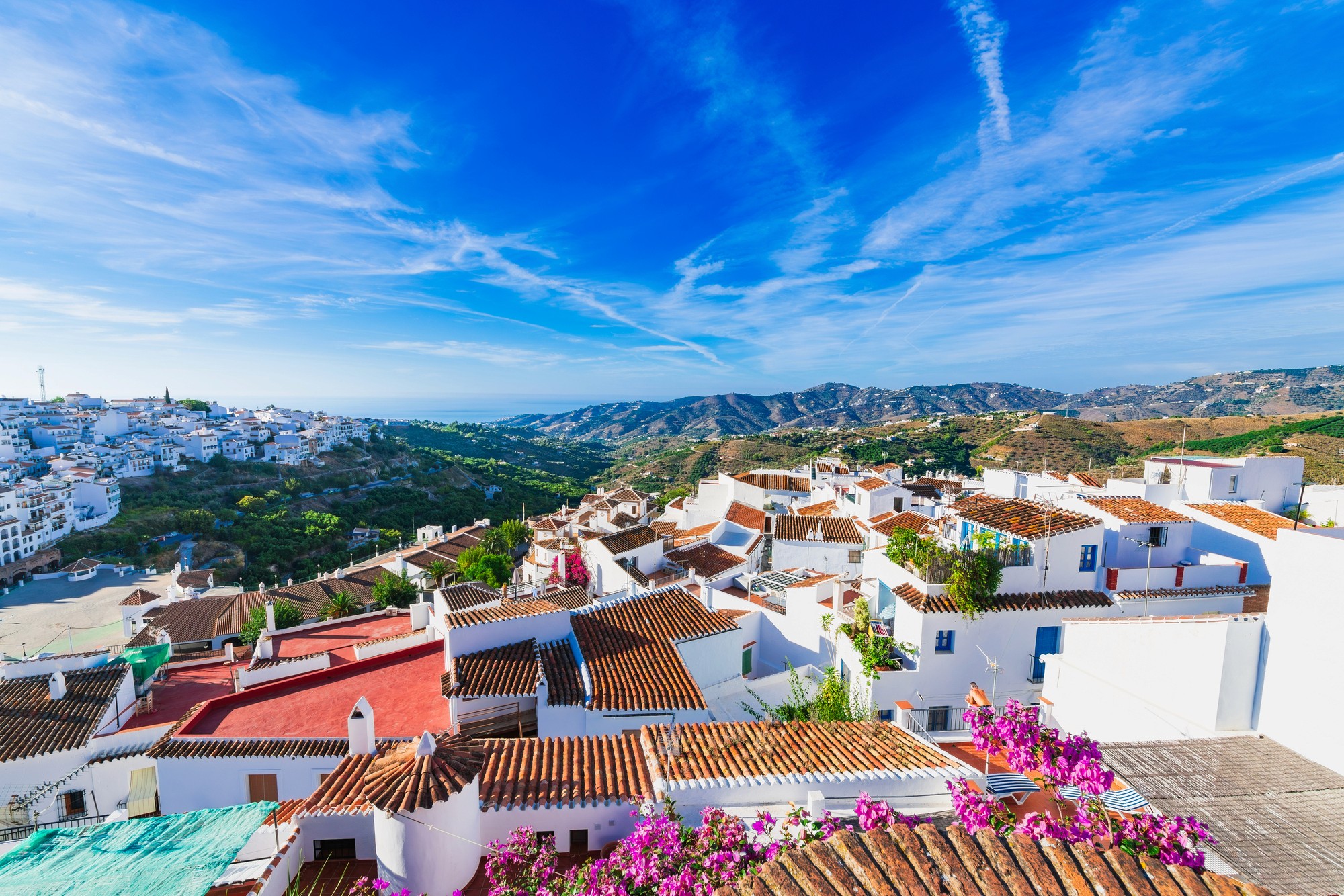 woman floating on body of water