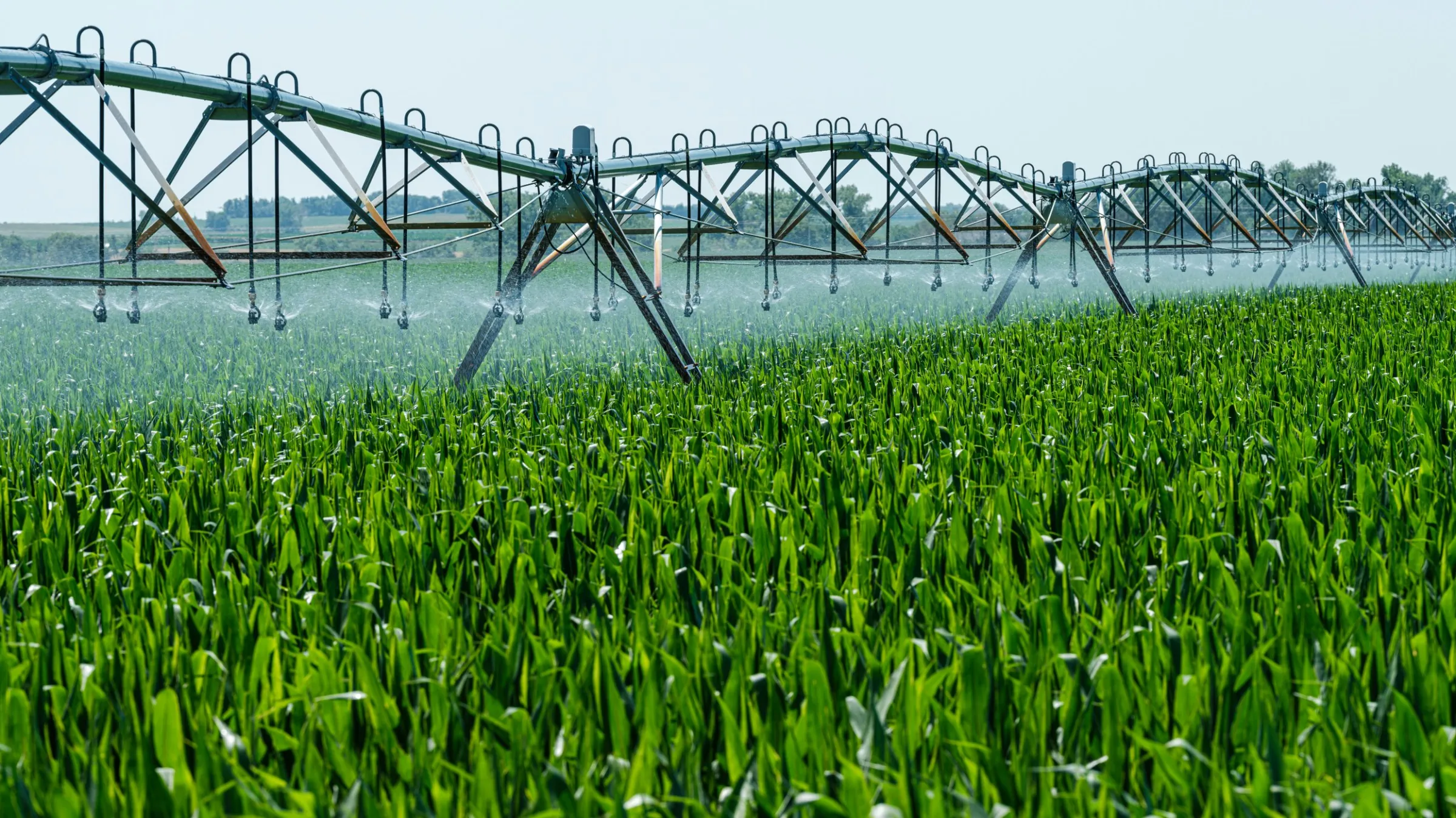 Center-pivot irrigation system watering a crop field
