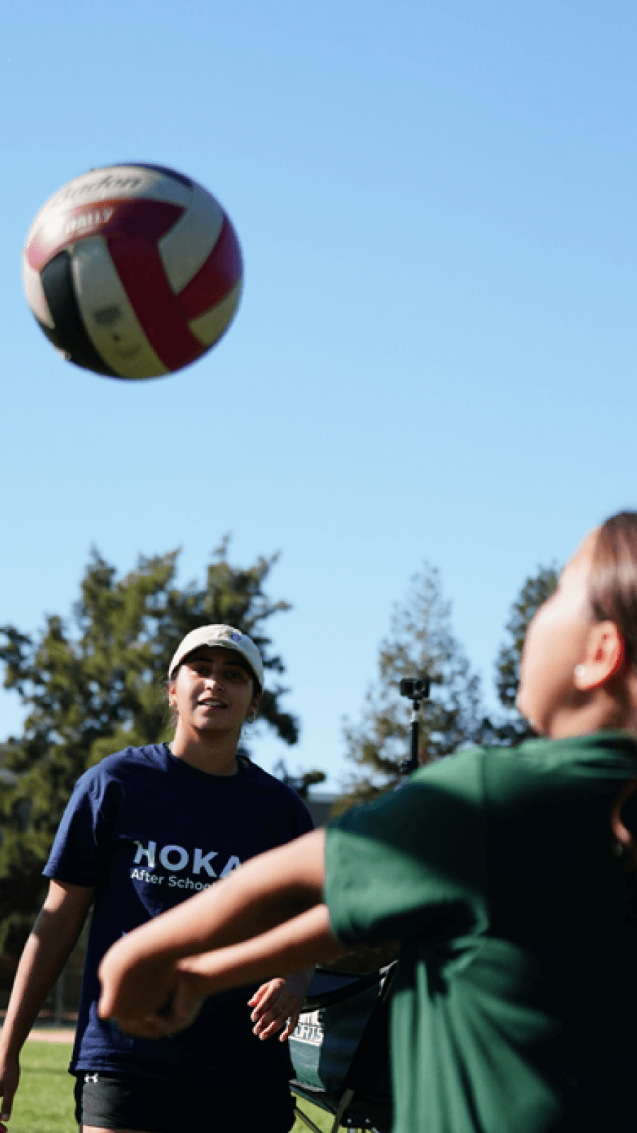 Students participating in outdoor sports during HOKALI after-school programs that promote teamwork and active play.