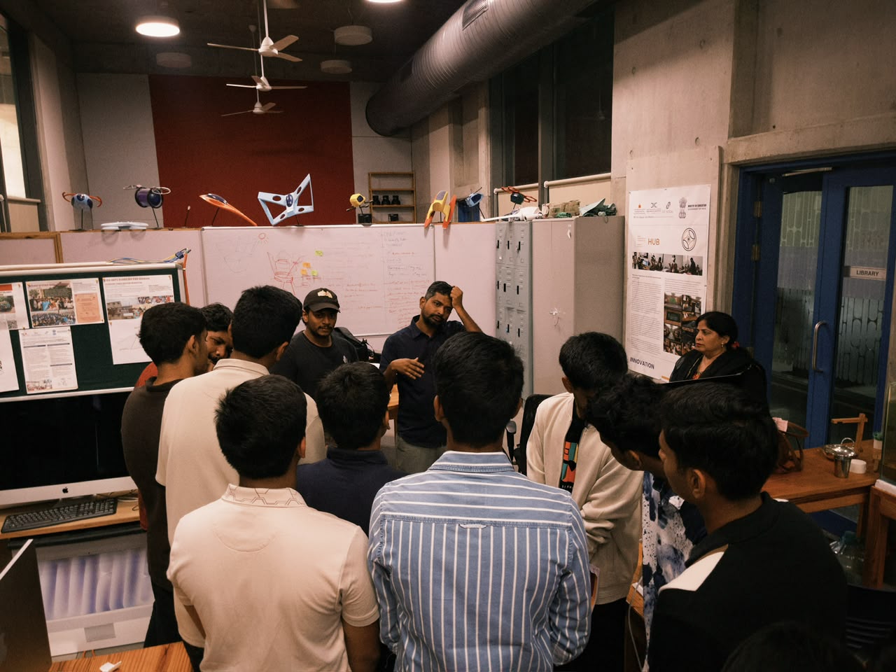 Students around fabrication equipment in the DIC lab — DIC Archives.