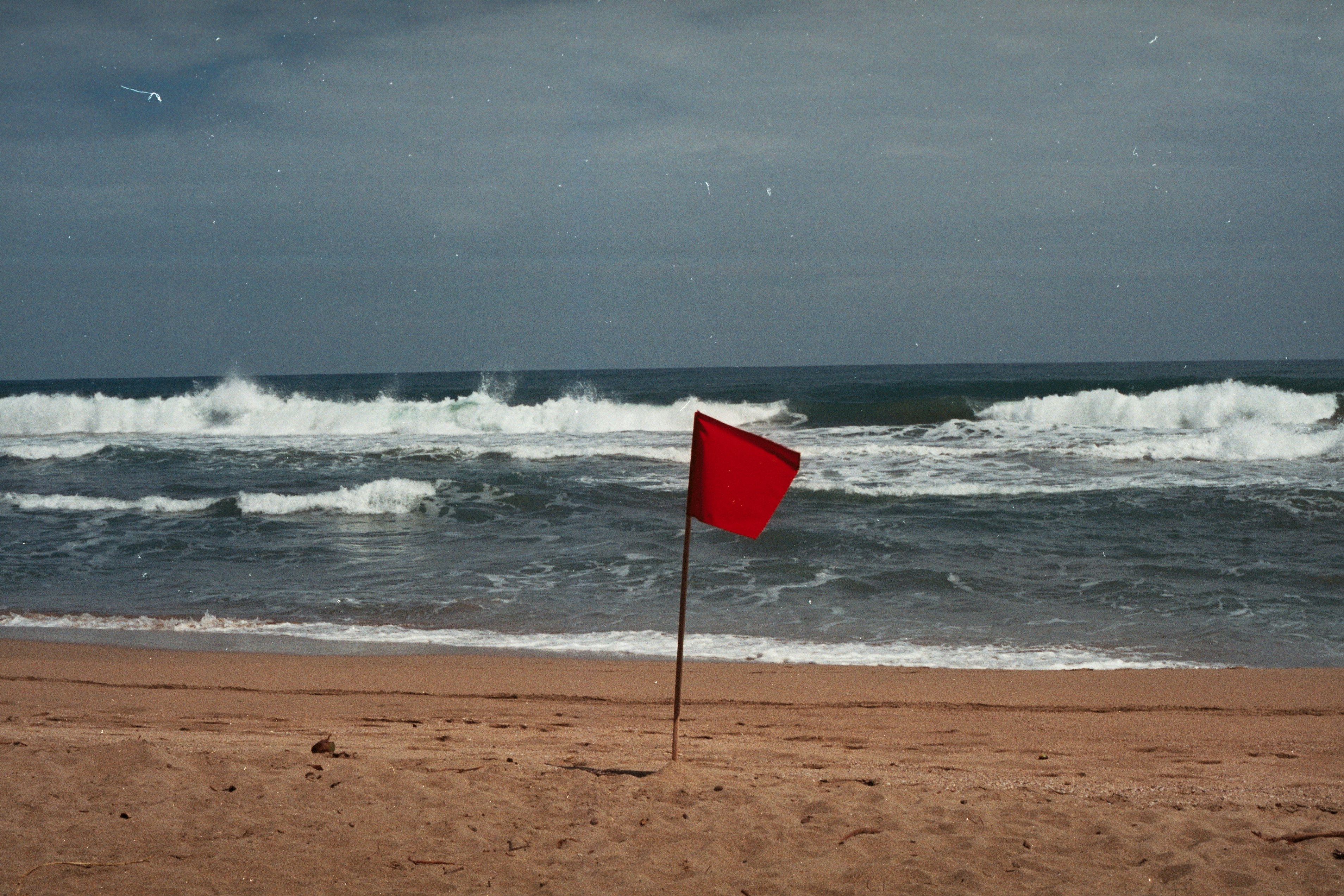 Red Flag on Beach