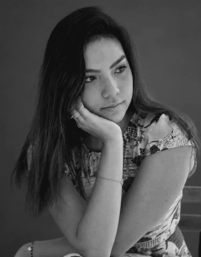 Black-and-white headshot portrait of Associate Brand Director Nicole Lee