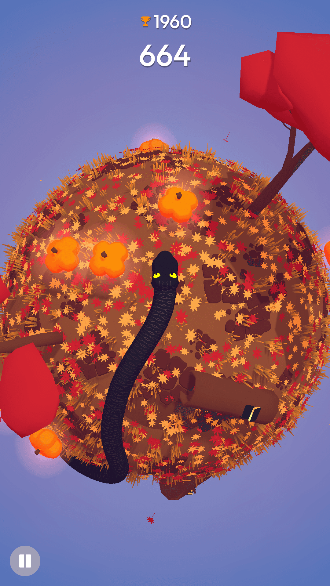 A long black snake on a spherical autumn-themened planet with red and yellow leaves on the ground, pumpkins and red trees.