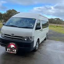 White Toyota HiAce passenger van washed and detailed at customer home 