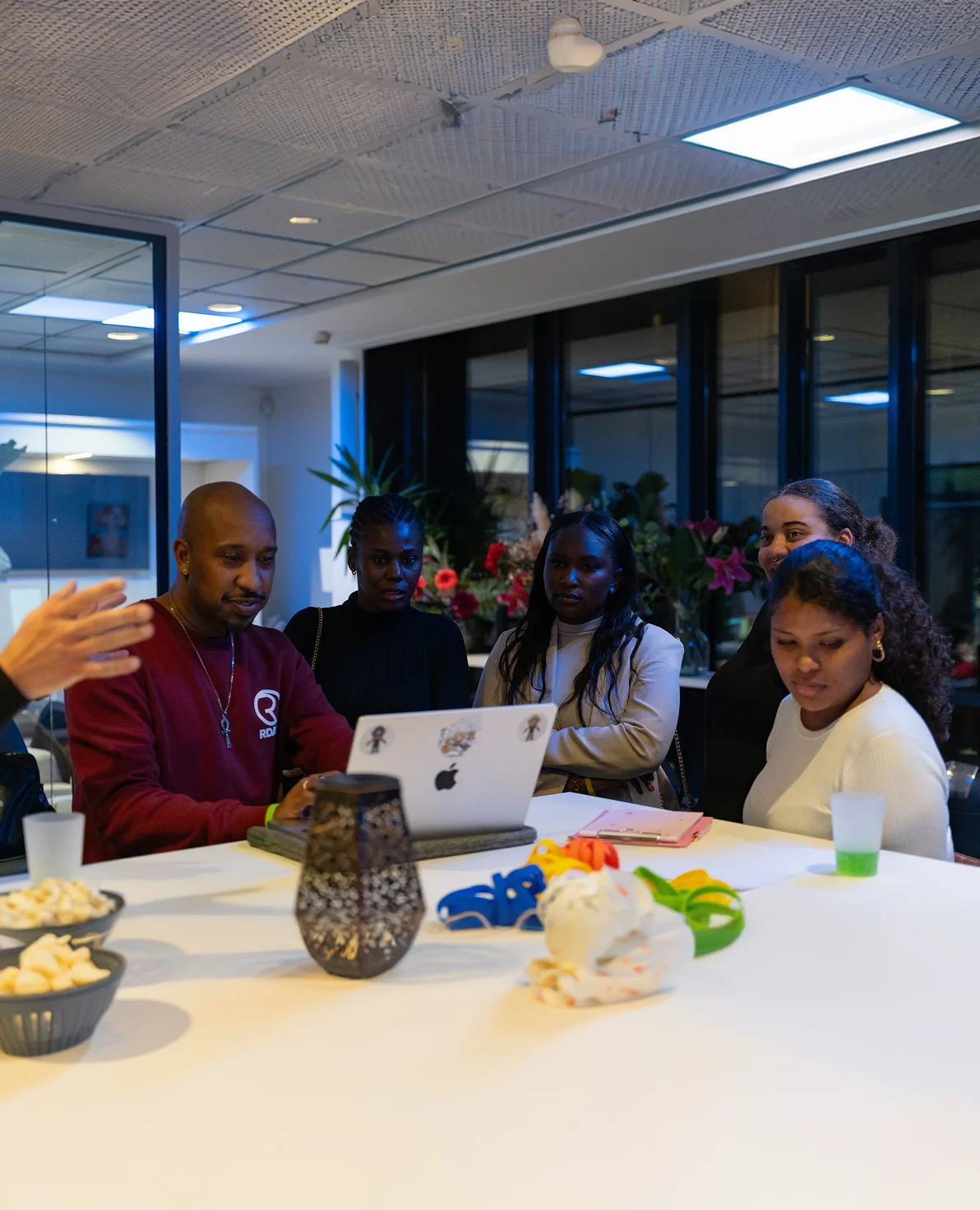 Randy Telg working through ideas with a group of young people