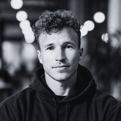 Sara is a client smiling to the camera happily