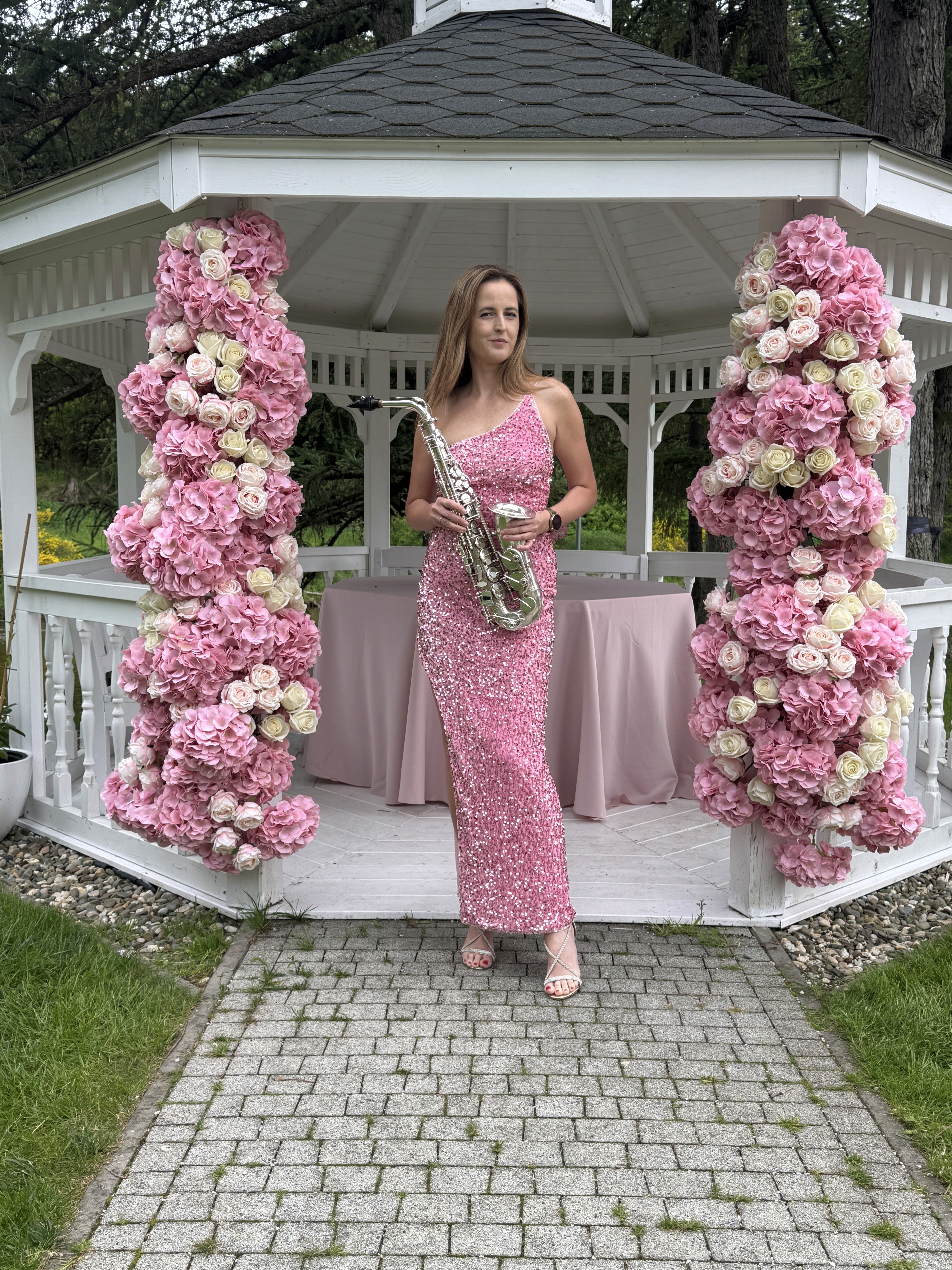 two people in a workspace working on their laptops 