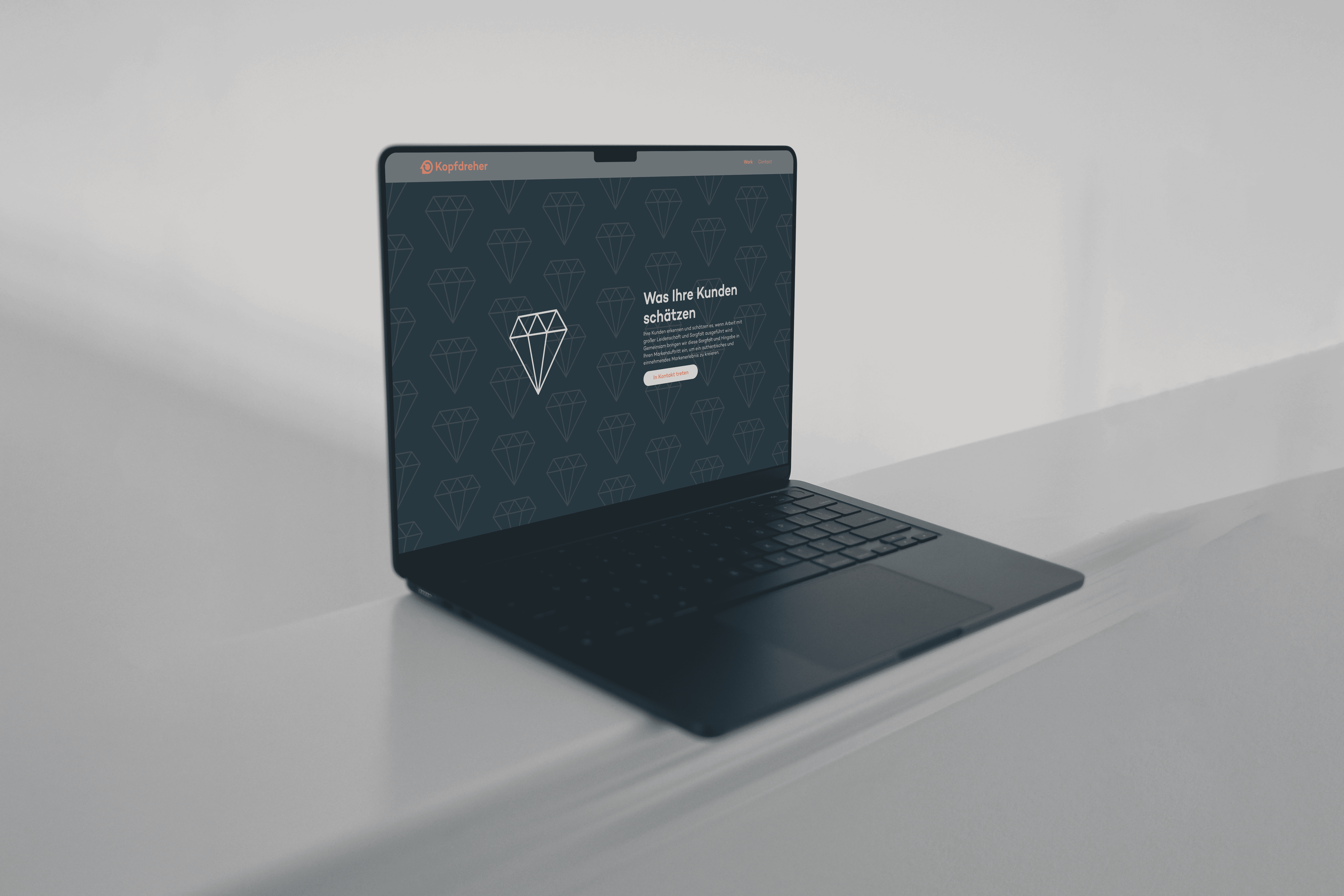 Ein MacBook-MockUp der Kopfdreher-Webseite