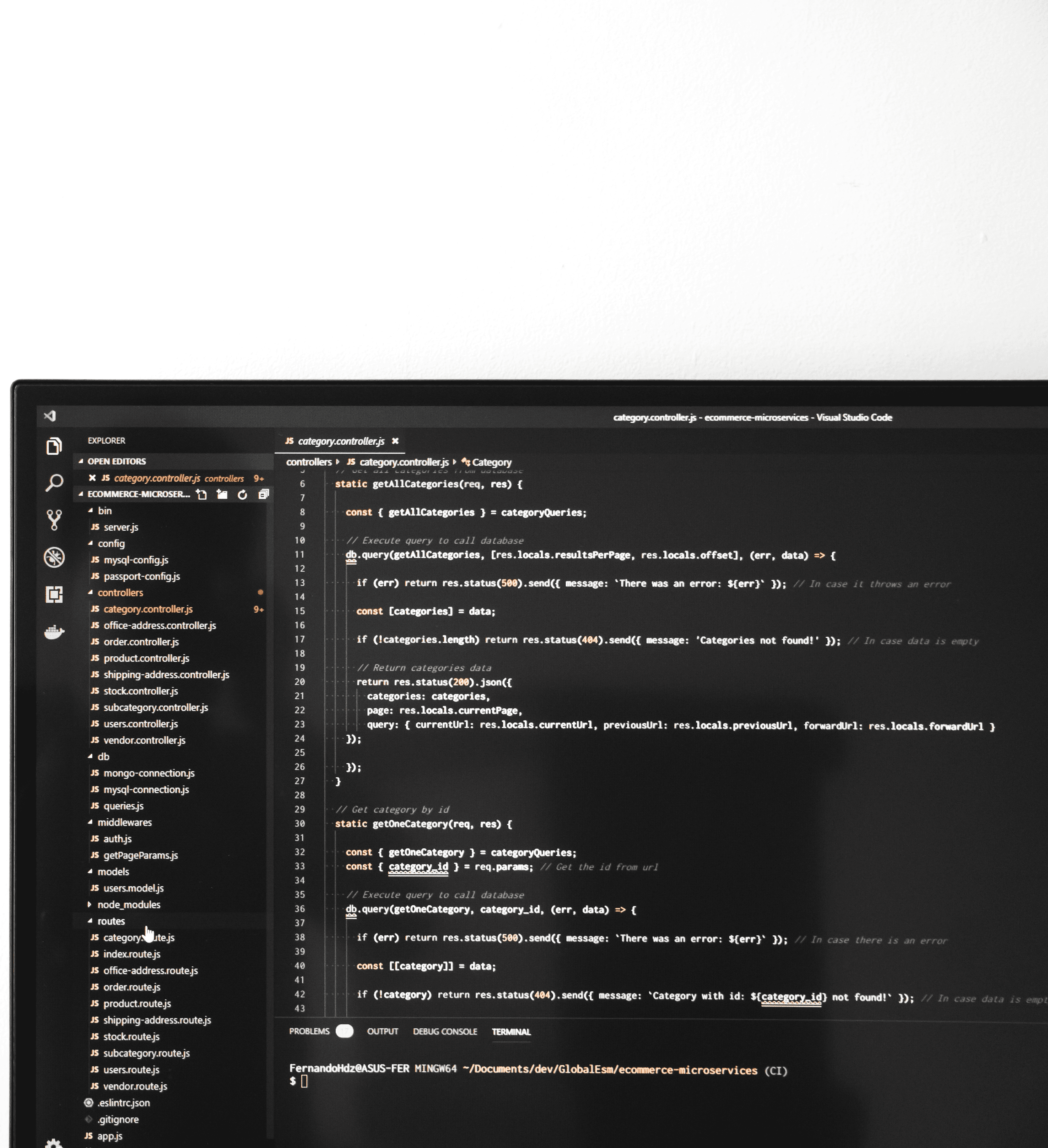 a computer monitor sitting on top of a desk
