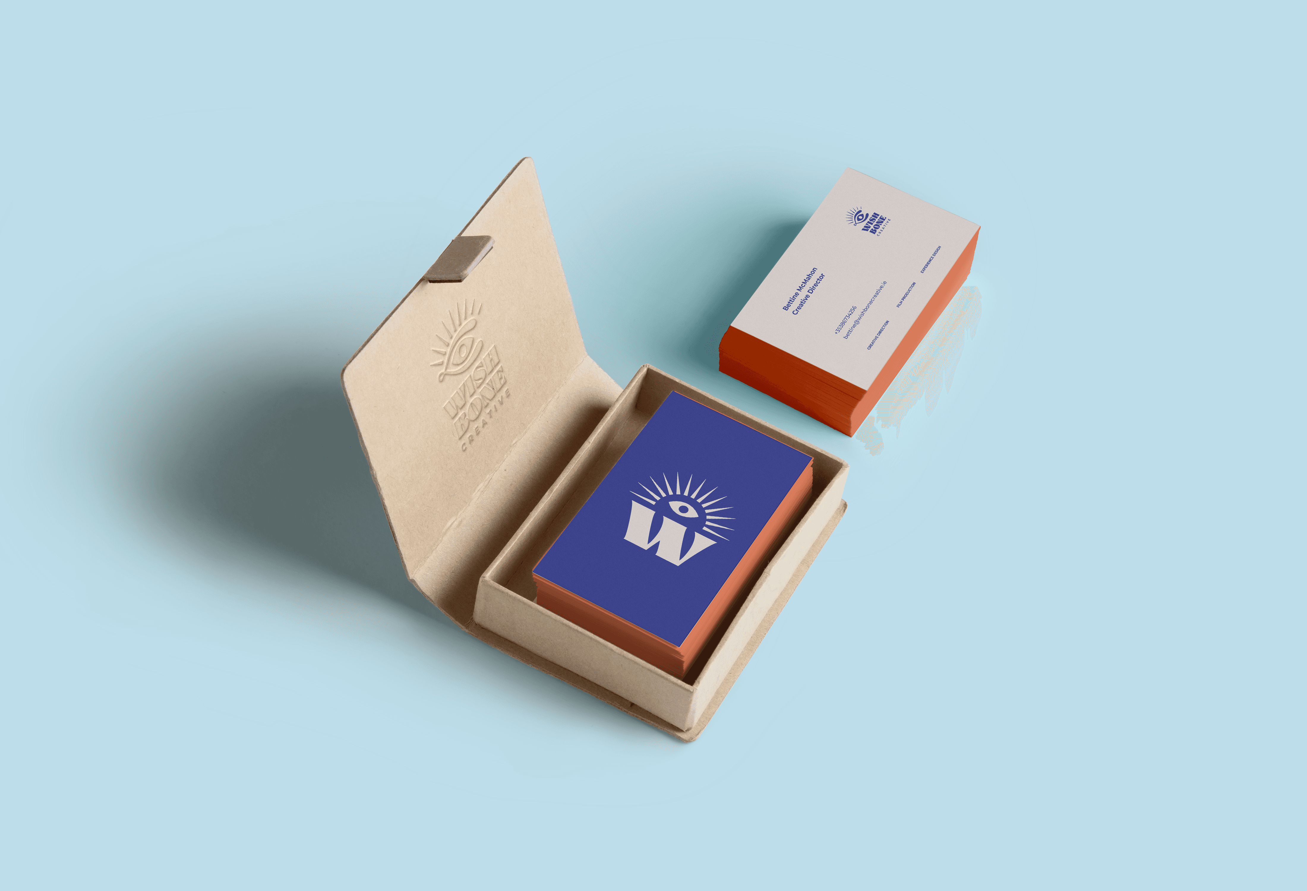 Book and card packaging flat lay – Irish agency brand presentation materials.