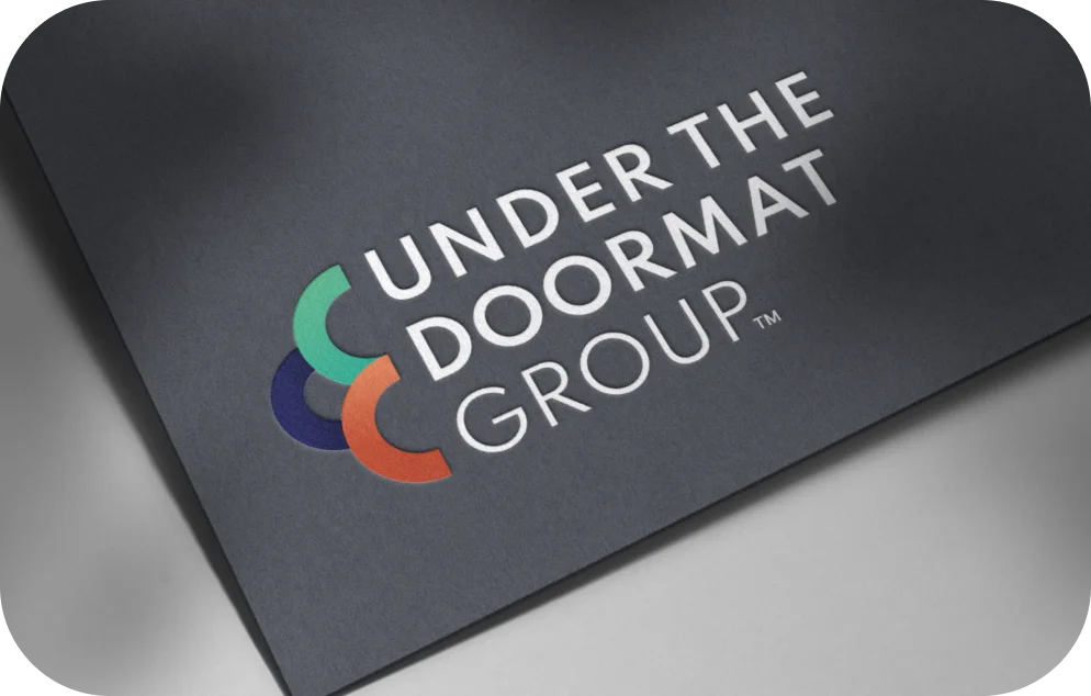 Under The Doormat Group logo