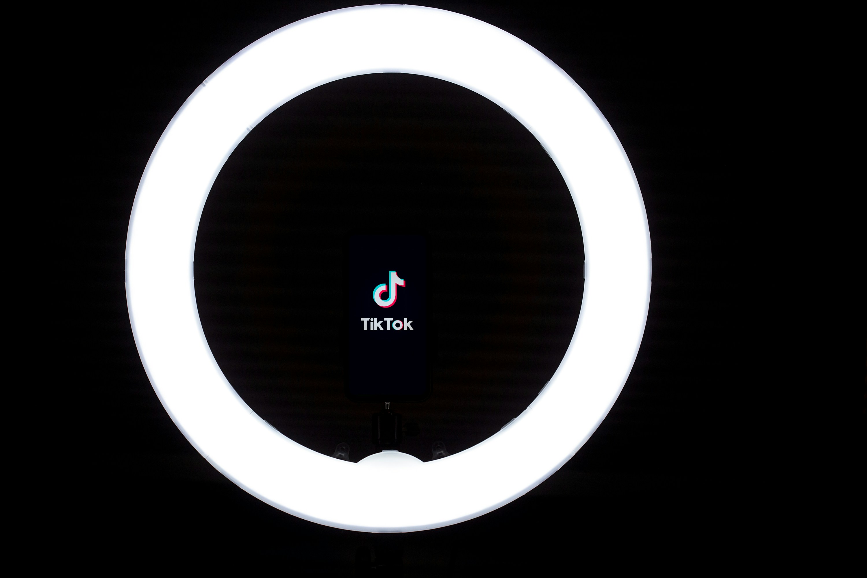 TikTok in a Ring Light - Schedule TikTok Posts