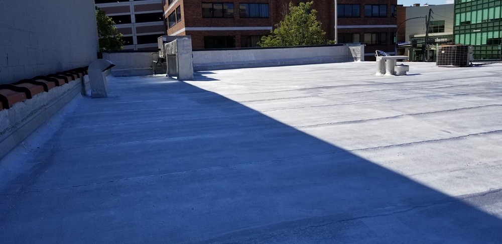 after complete roof replacement with new 3/4 plywood, felt paper and App-160 rubber roof membrane installation by Jewel Construction in Park Slope