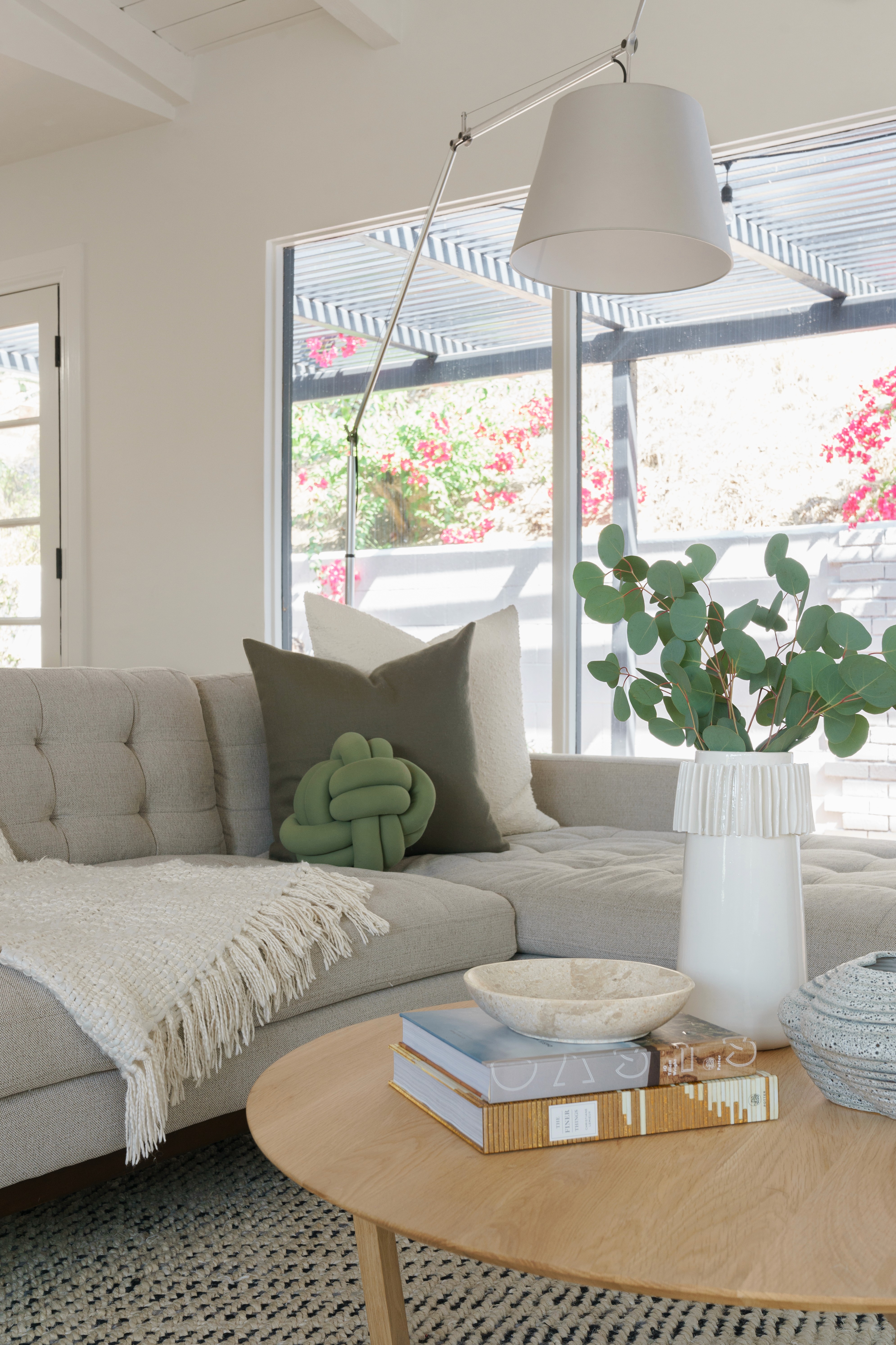 Mid-century living room refresh with a blend of classic design and contemporary comfort  by Ventura & Los Angeles interior designer Jubilee Interiors