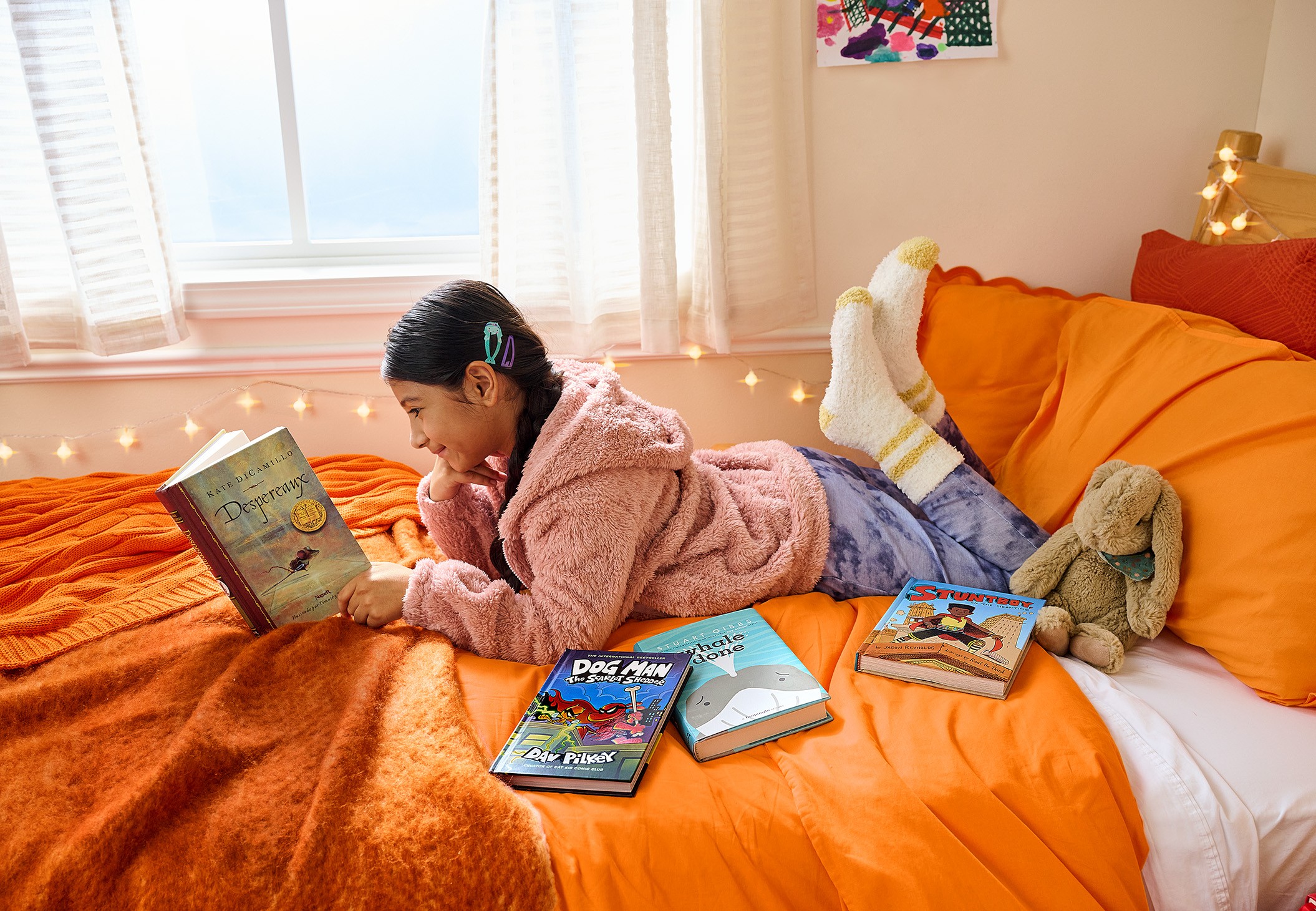 Streetside billboard with flyposters of the Batch.Works brand and illustrations