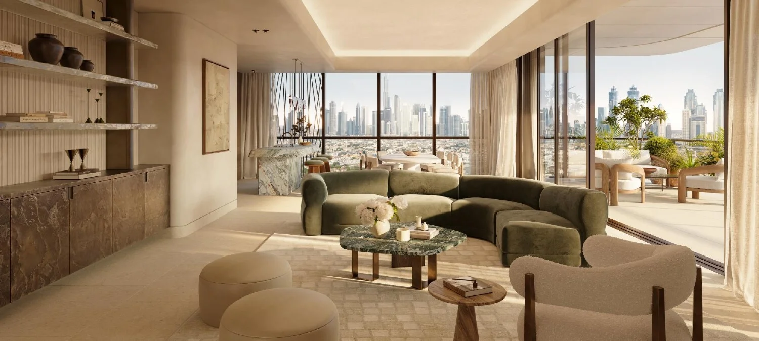 Spacious open-concept living room with floor-to-ceiling city views. Luxury interior at Rosewood Residences.