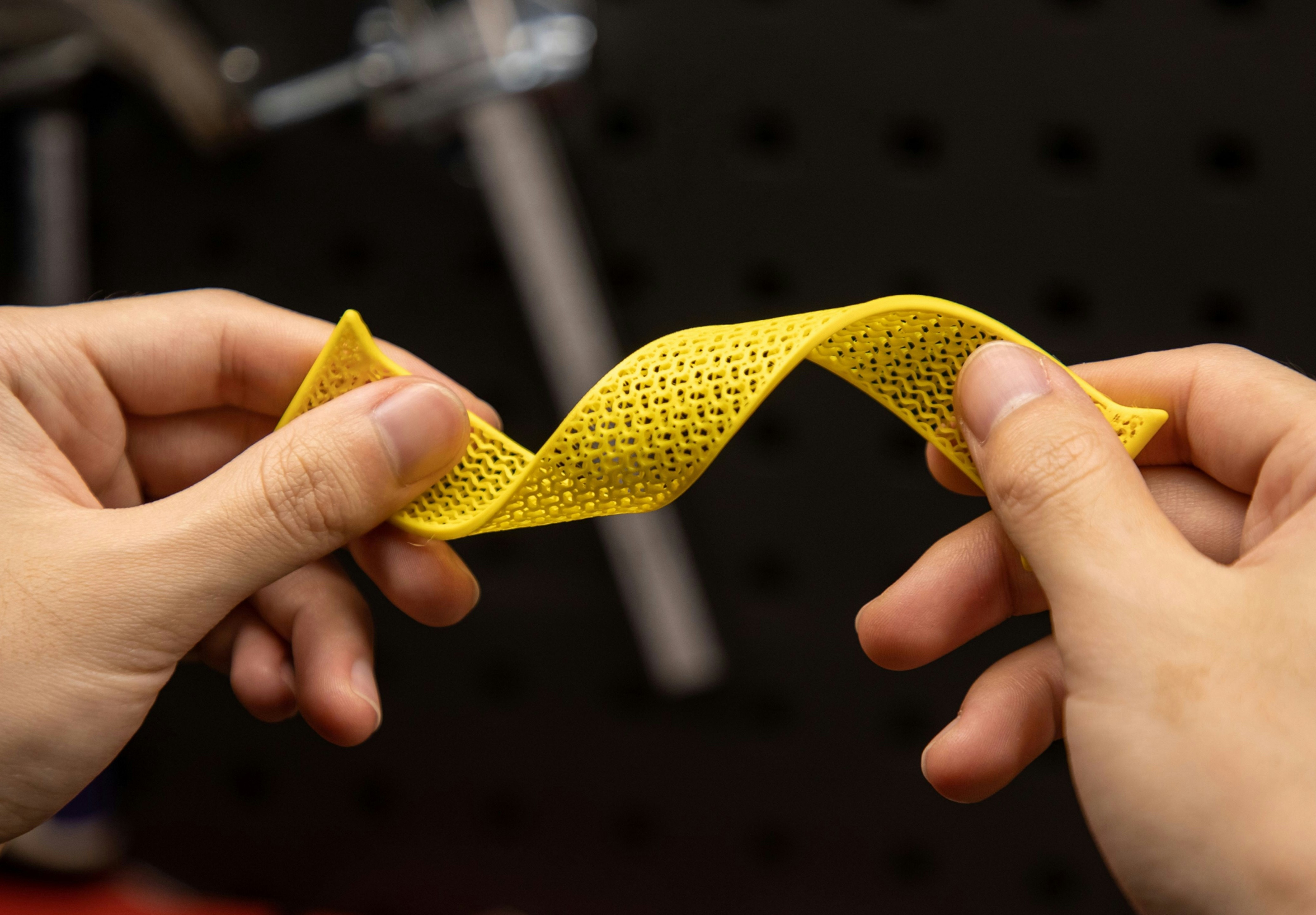 husband and wife working happily on a laptop