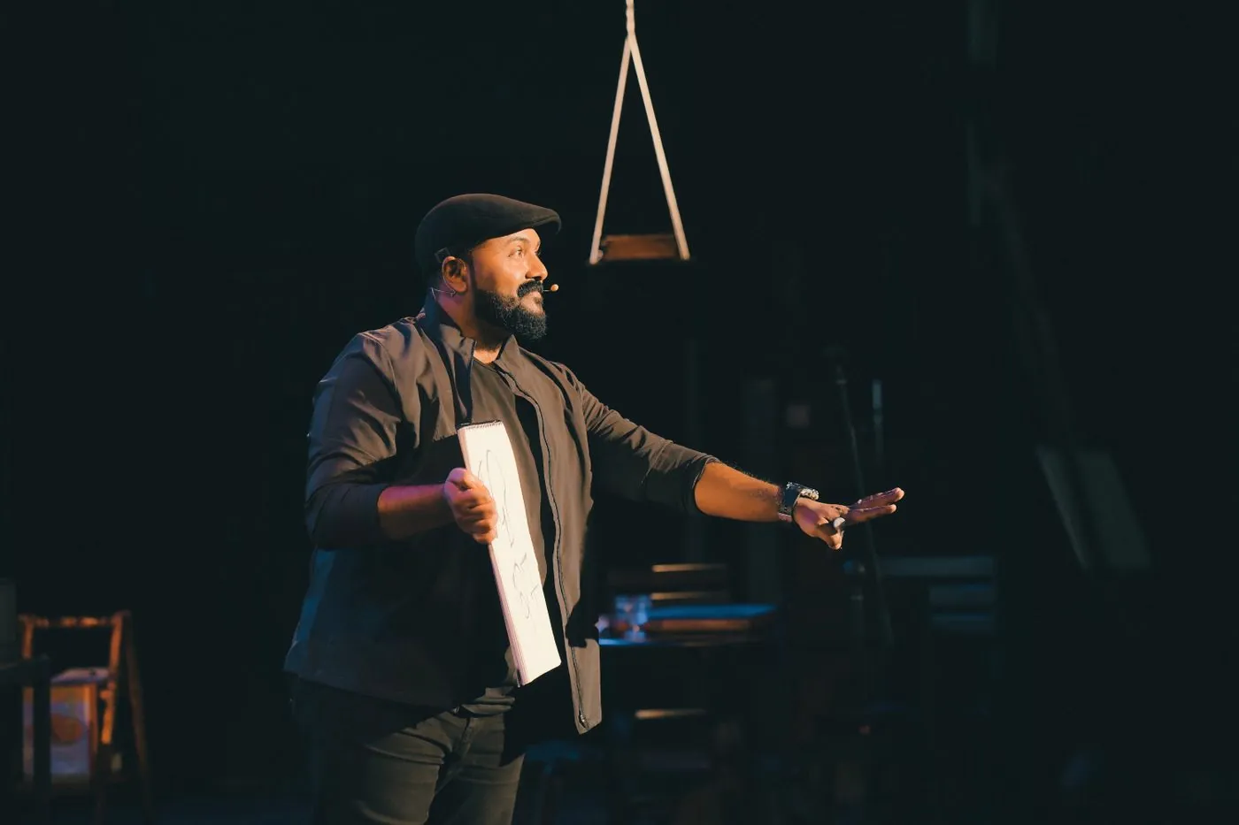 Sam Keller speaking on stage at Confluence Church