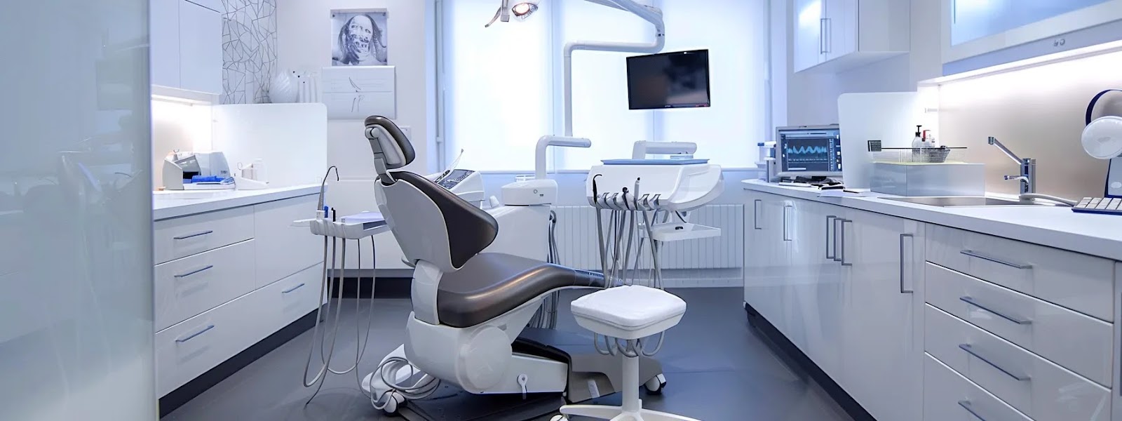 a sleek, modern dental clinic interior showcases a state-of-the-art treatment chair surrounded by pristine, high-tech equipment, illuminated by soft, ambient lighting that emphasizes a clean and welcoming atmosphere.
