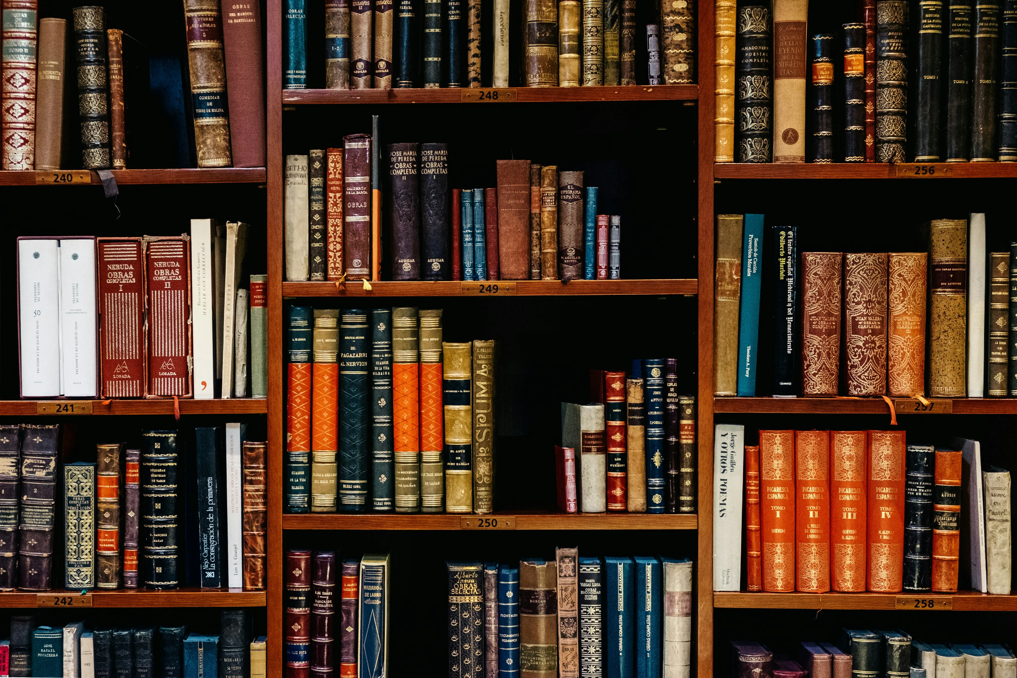 A book shelf filled with lots of books