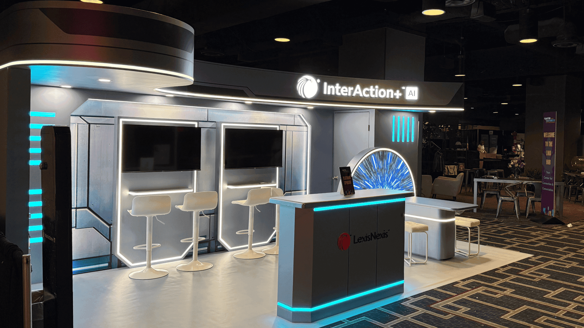 InterAction+ LMA 2026 10x20 legal CRM demo booth in New Orleans with screen-based product presentation and aisle-facing messaging