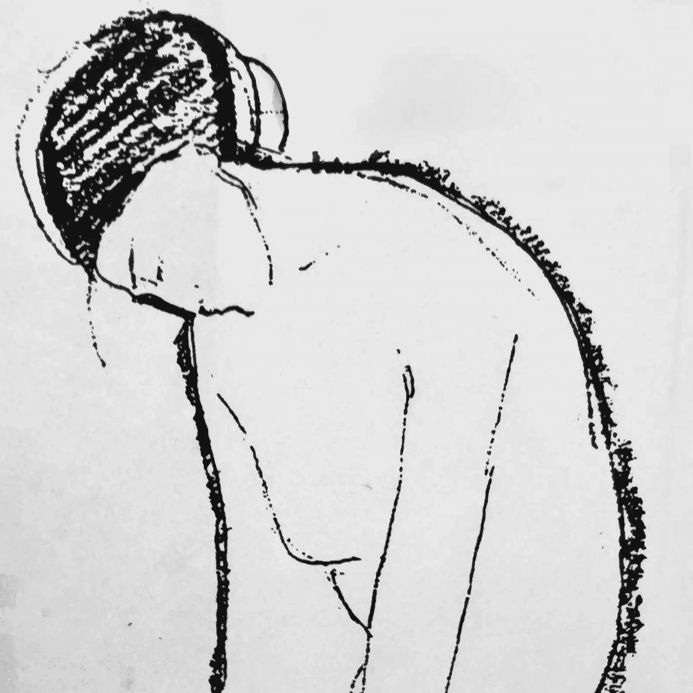 man in orange long sleeve shirt sitting on gray couch