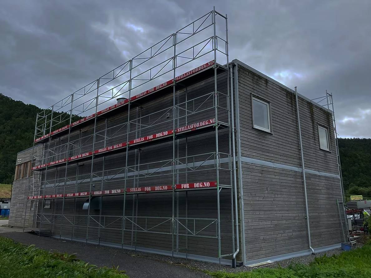 a close up of a roof with a blue sky in the background