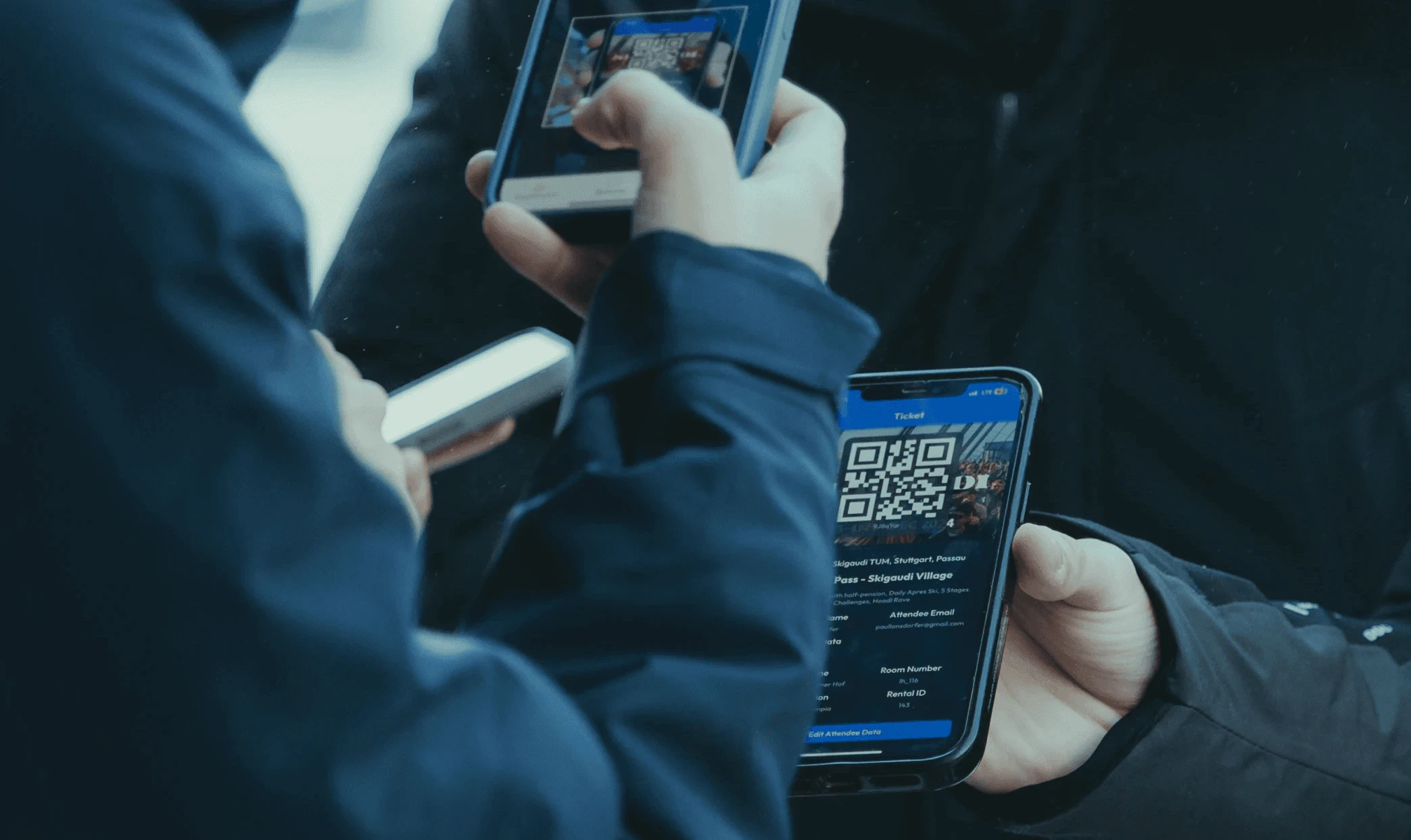 People scanning digital tickets with QR codes on smartphones.