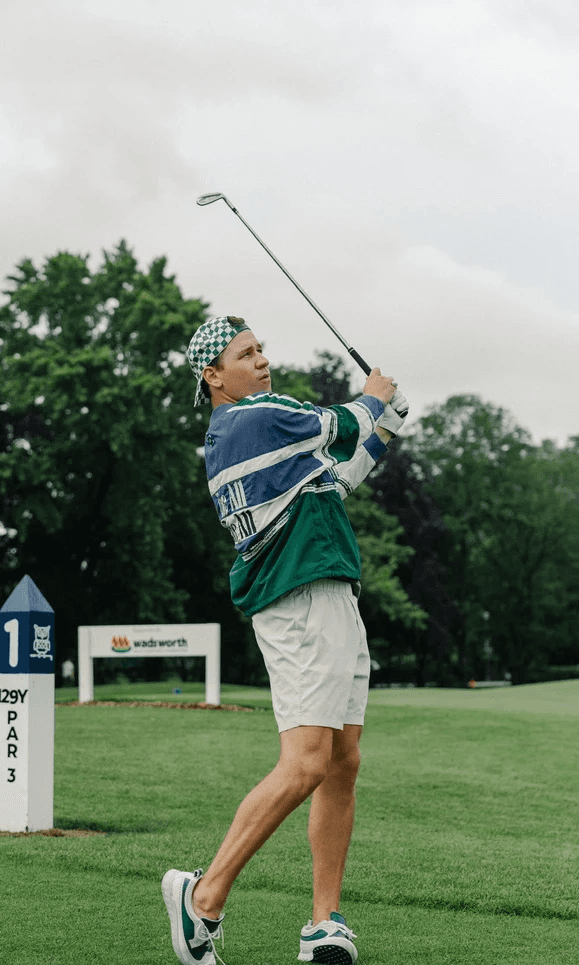 man wearing yellow shirt