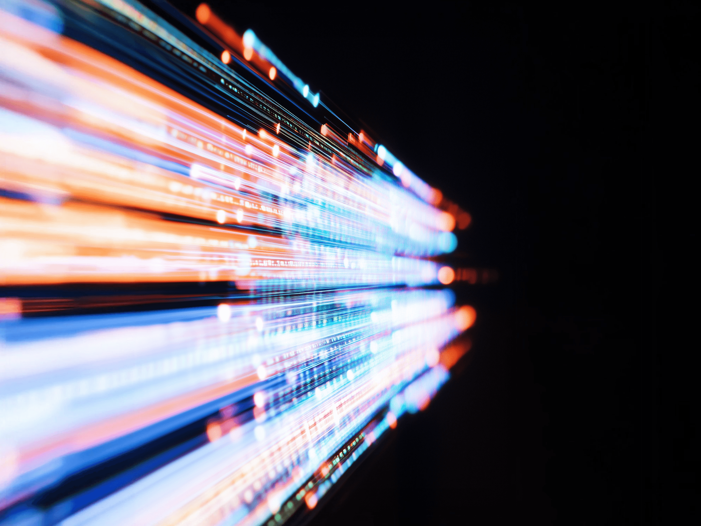 Abstract light trails converging in dark space —  finding cultural patterns across local and  international markets in brand design research