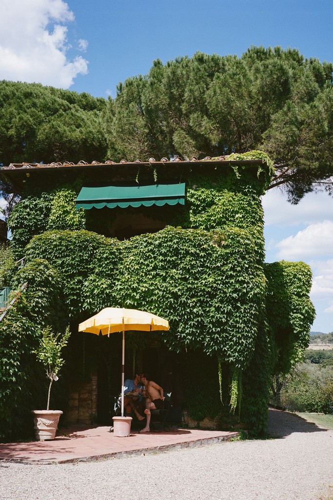 Ivy-covered villa exterior on a sunny day