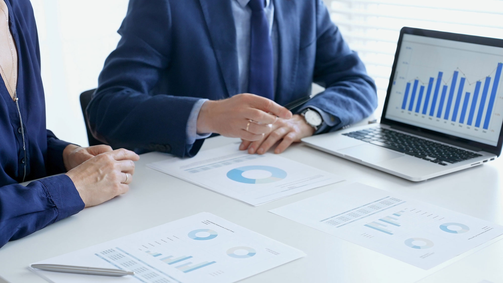 View of containers in motion at a large logistics hub located in a port.