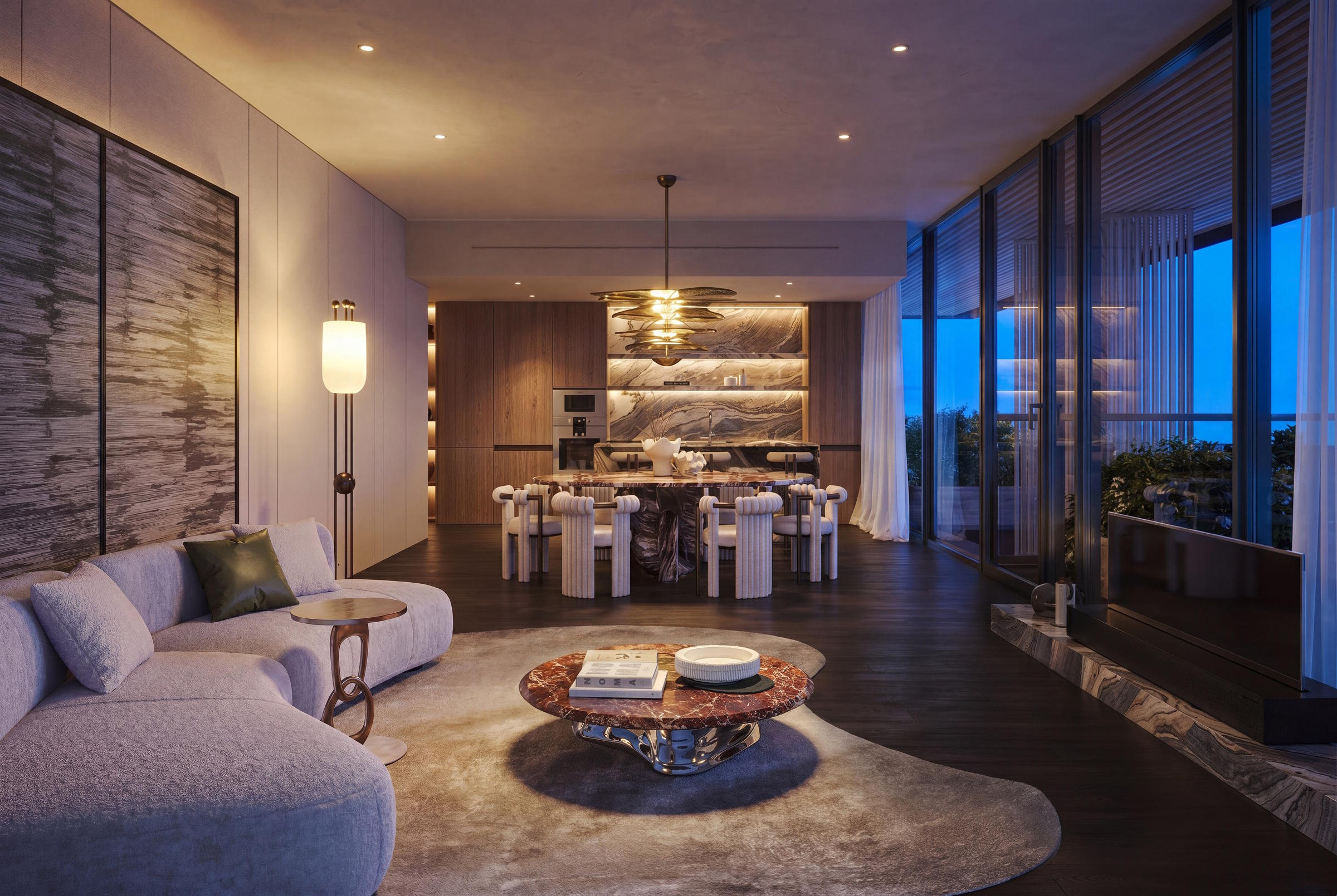 Bright open-concept living and dining room overlooking a private terrace with sea views.