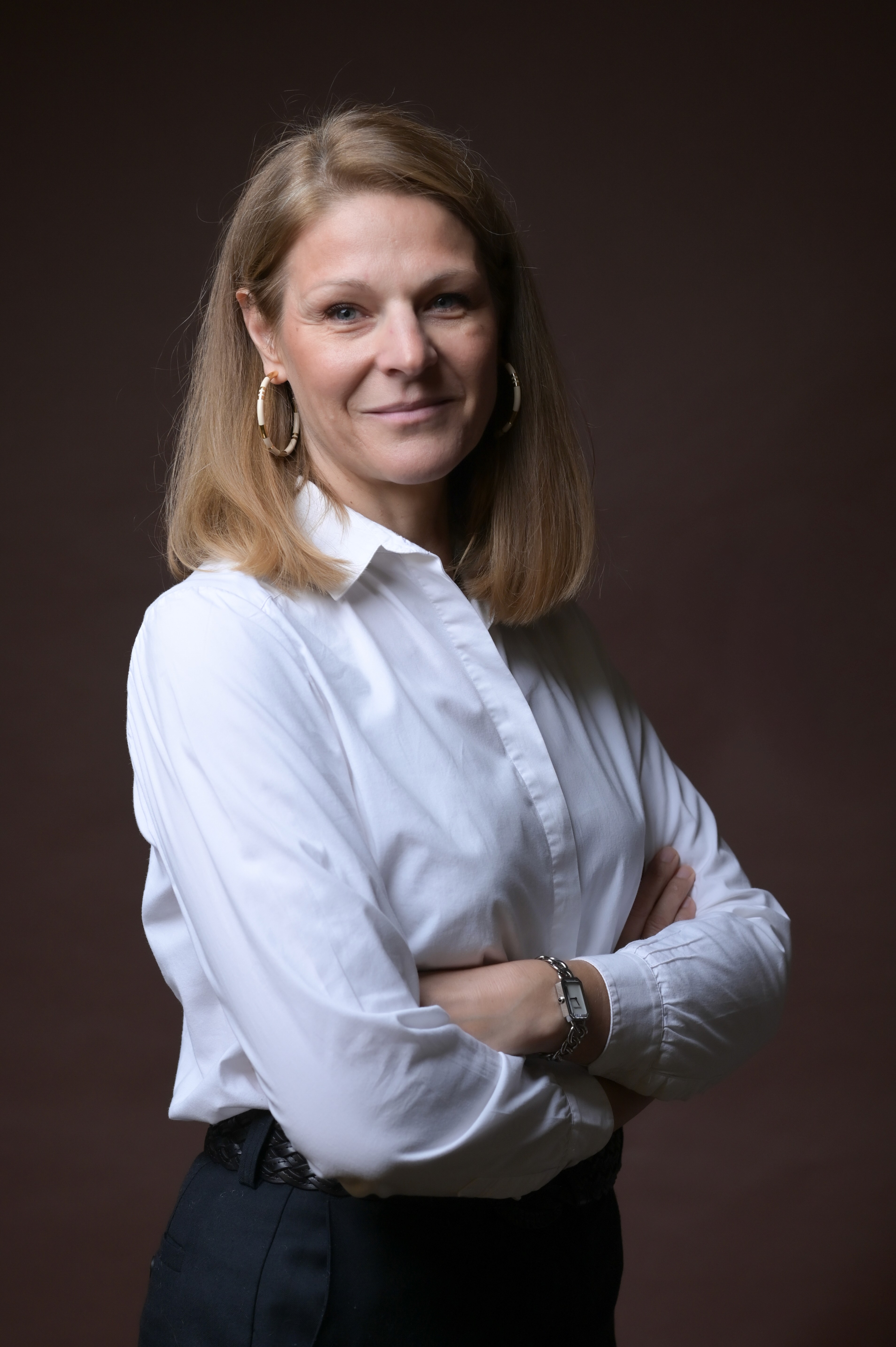 person sitting in a chair in front of a man