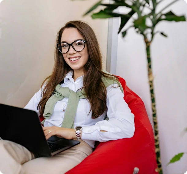 a woman is working on laptop