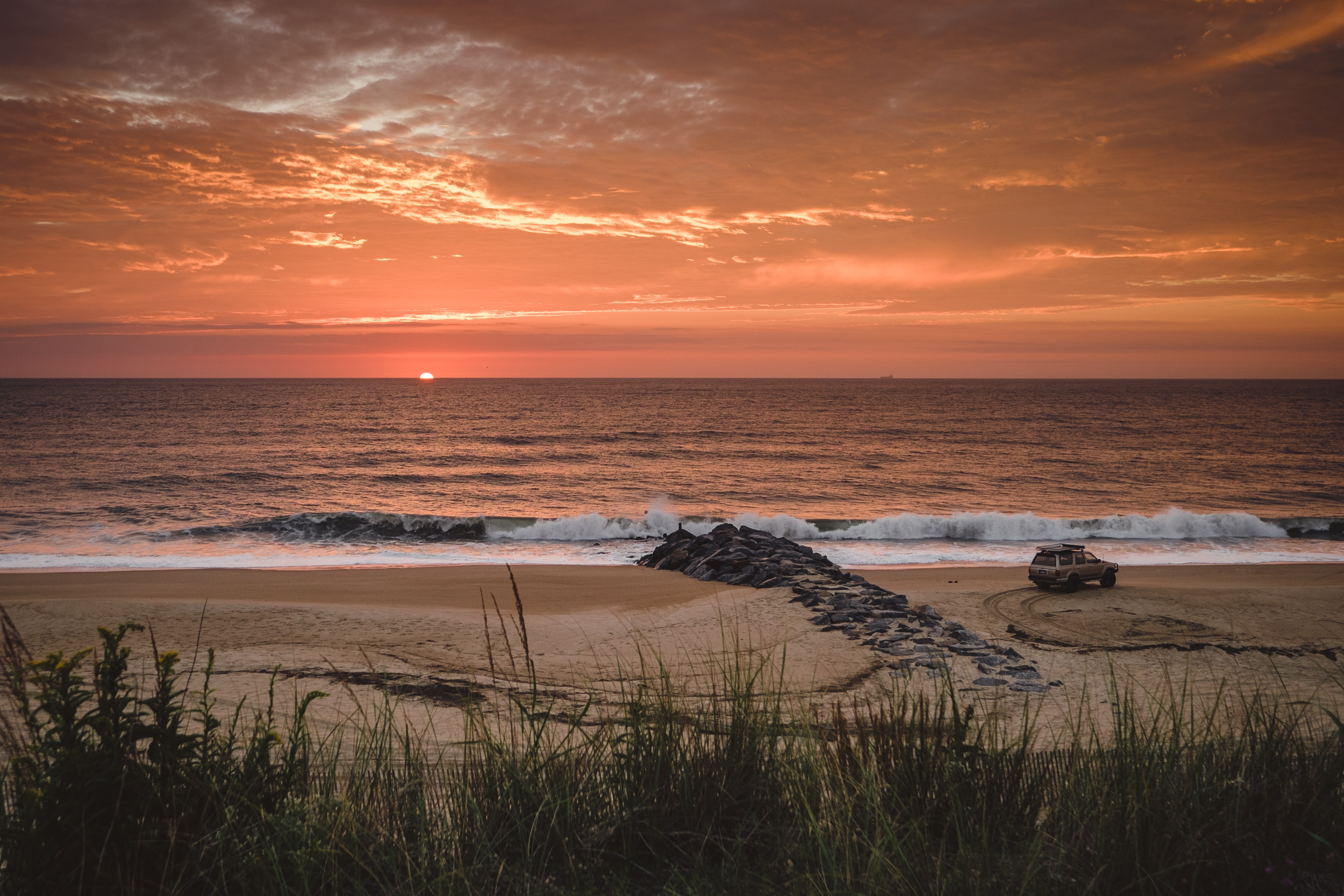 Dramatic red-orange sunset over Delaware Beach, USA