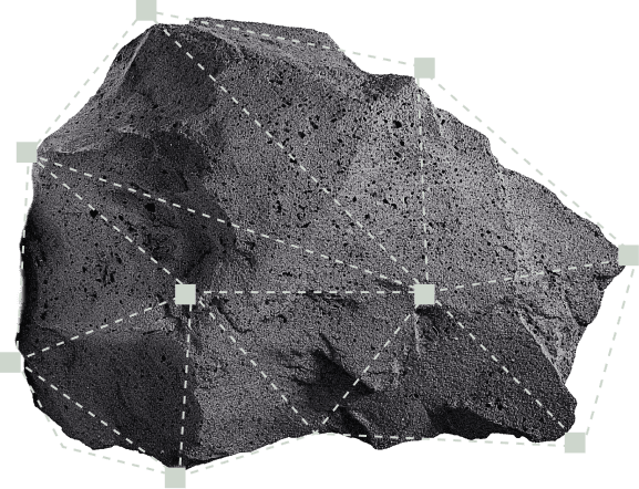 A large, textured black rock is showcased with geometric lines and highlighted corner points, illustrating a digital mapping or 3D modeling concept.