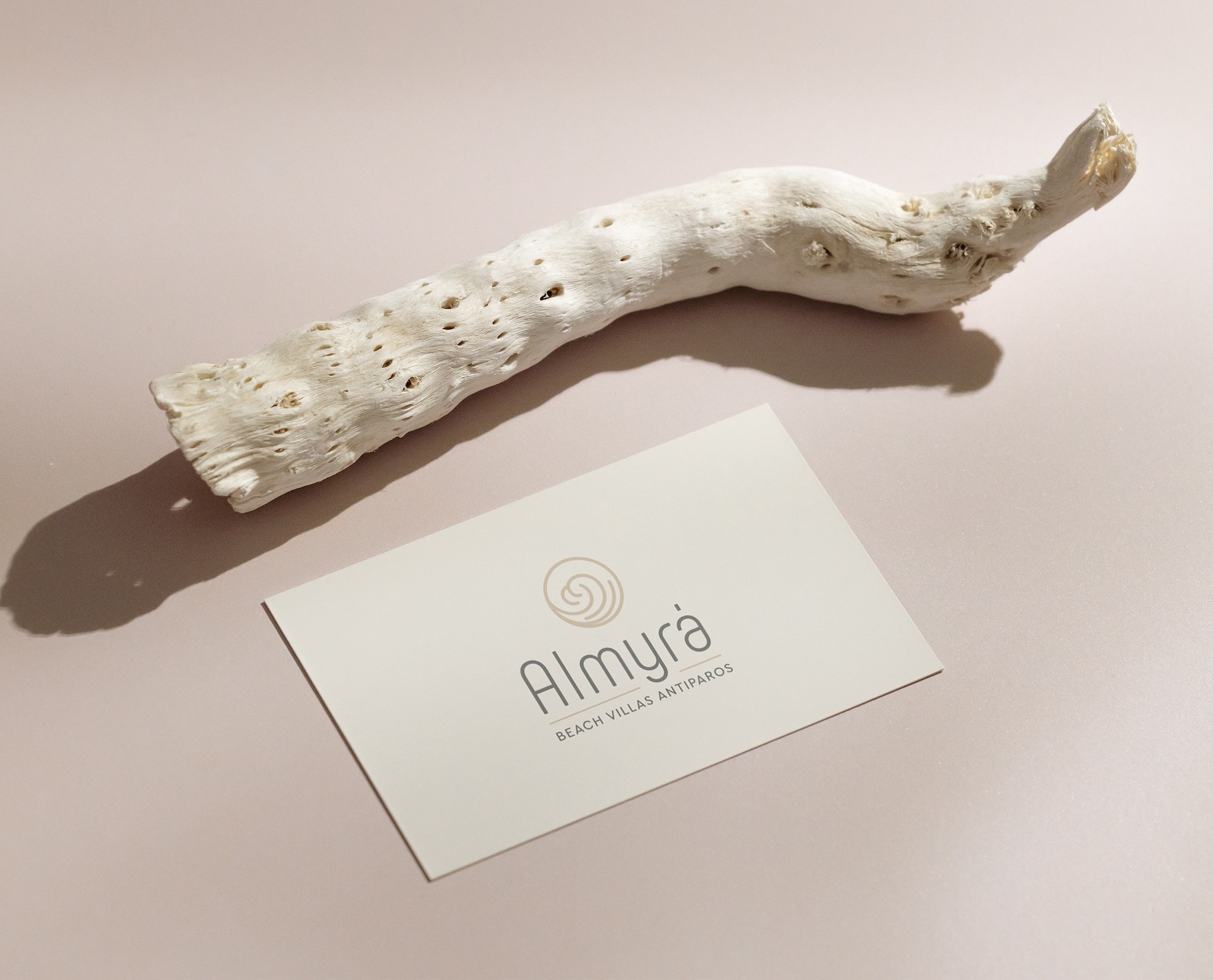Almyra Antiparos brand identity logo on neutral background