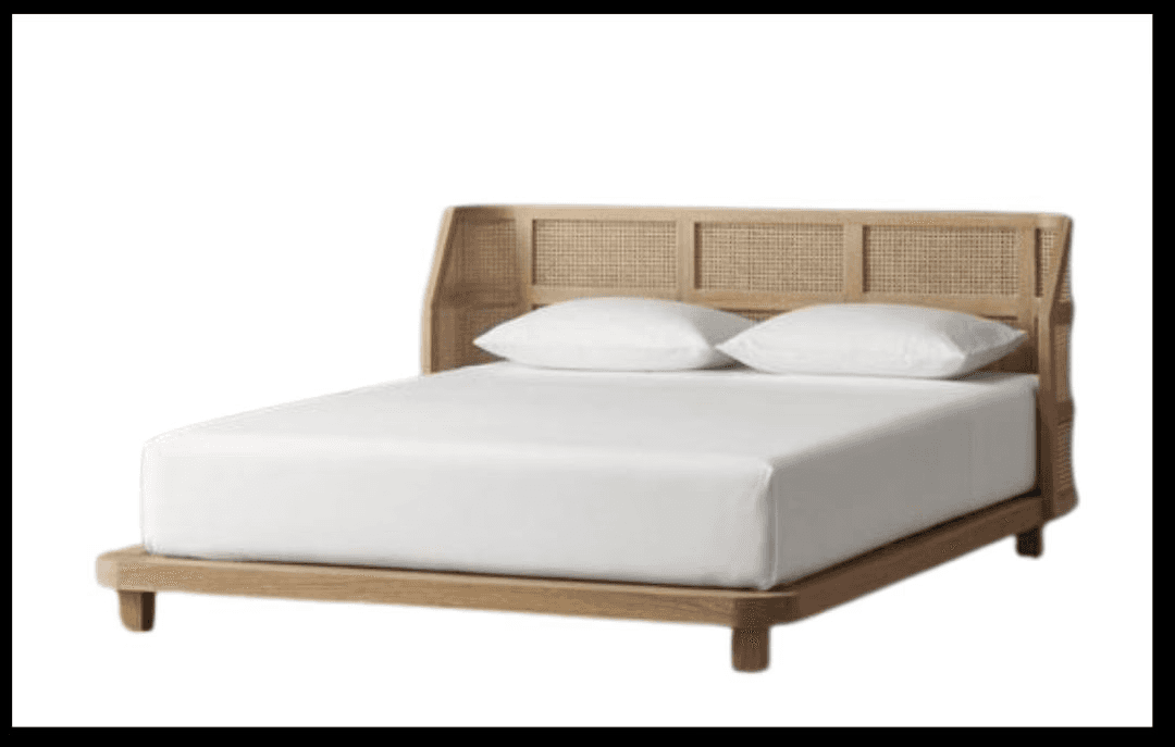Rattan-paneled bed with curved natural wood frame.