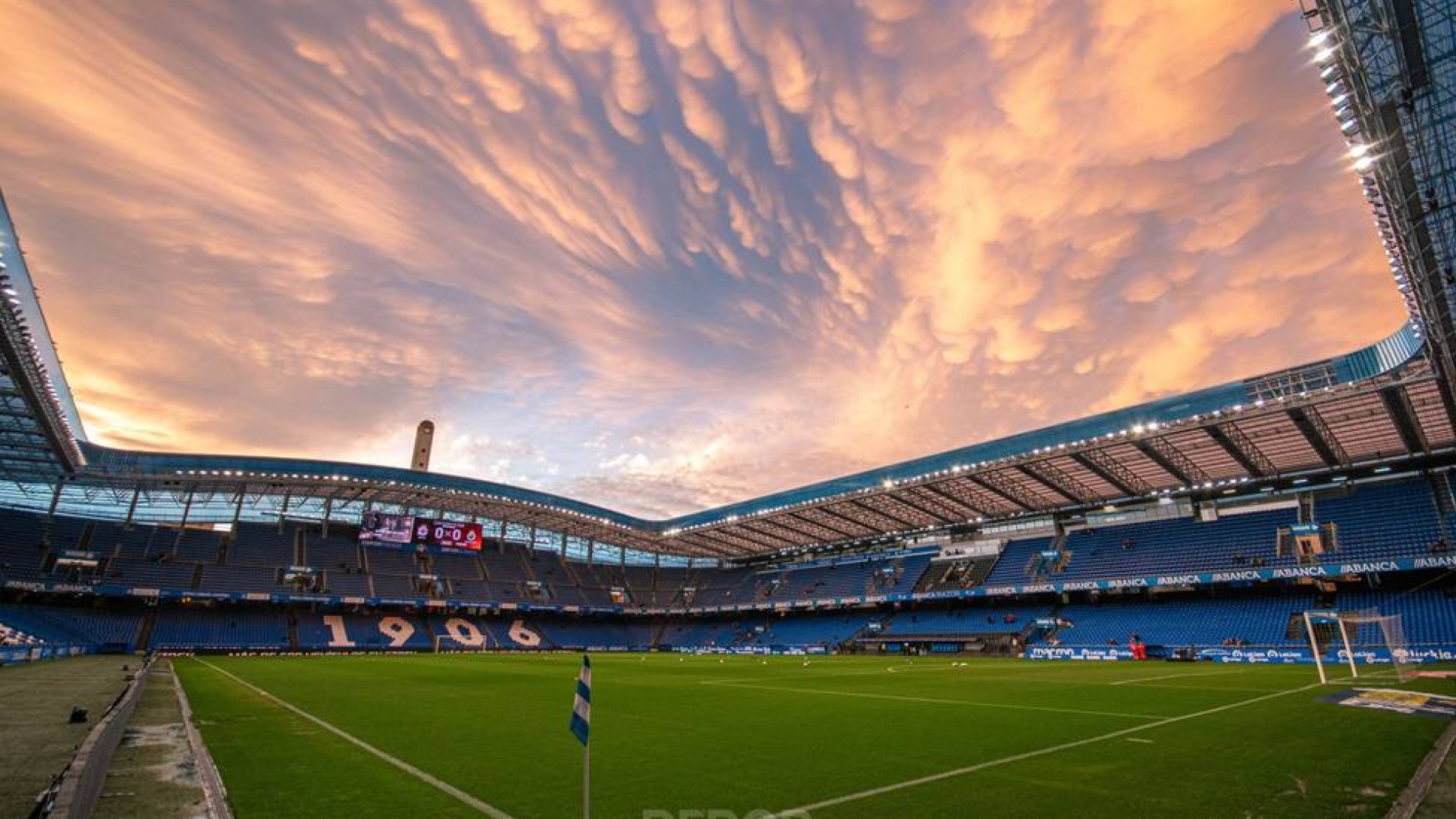 Drone shot of a running track at night