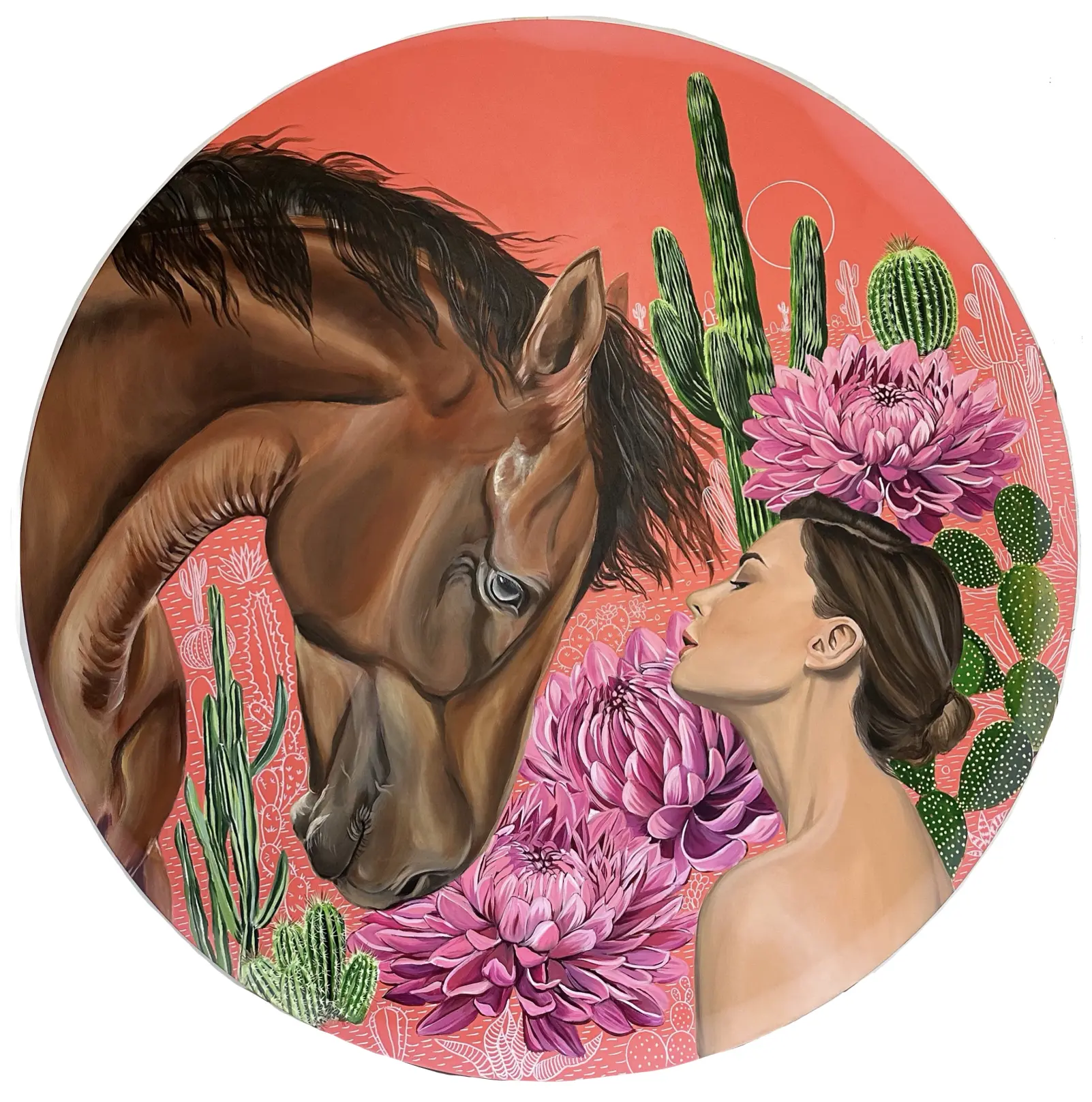 A circular painting of a woman gently leaning toward a brown horse, surrounded by blooming pink flowers and tall cacti on a vivid coral background.