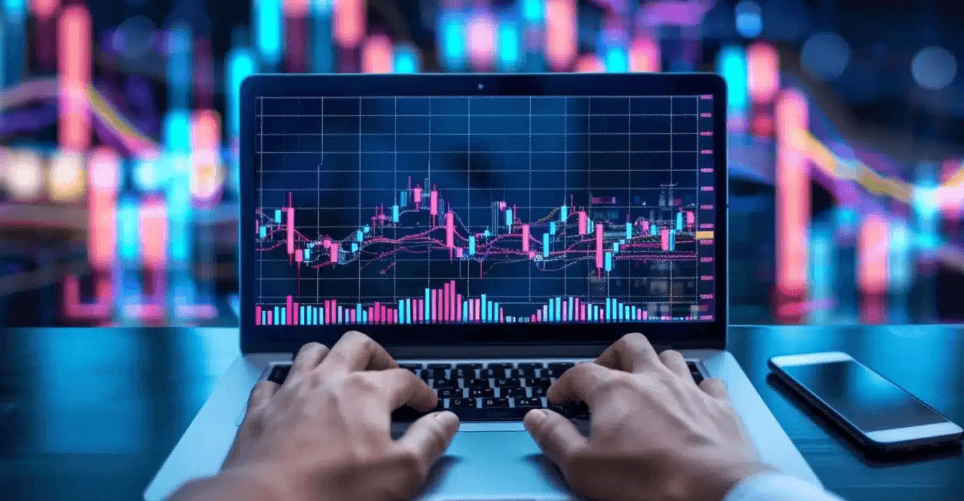 Person reviewing trading charts - Best Crypto Algo Trading Platform