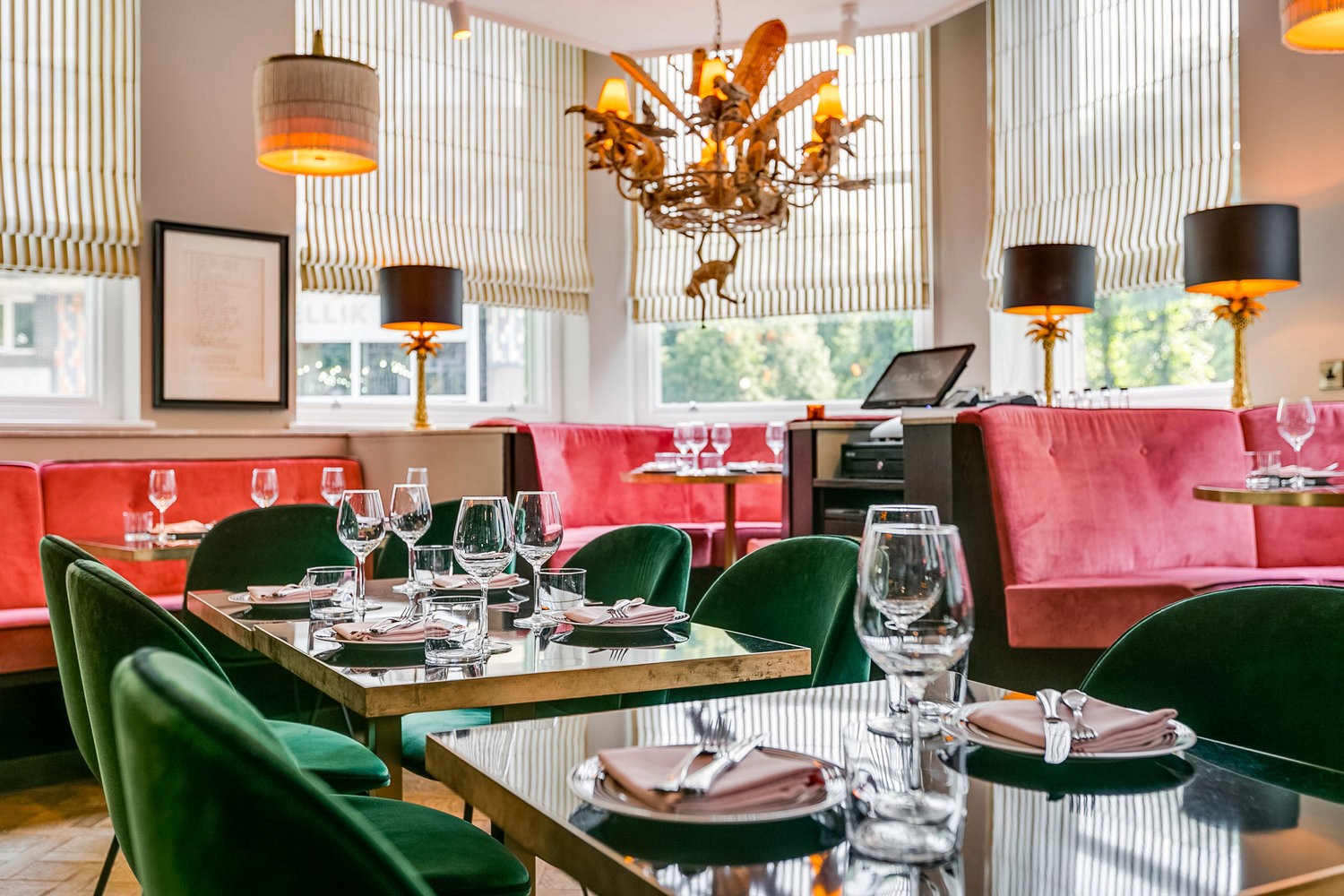 LayLow members club dining space with pink banquette seating and bespoke hospitality joinery