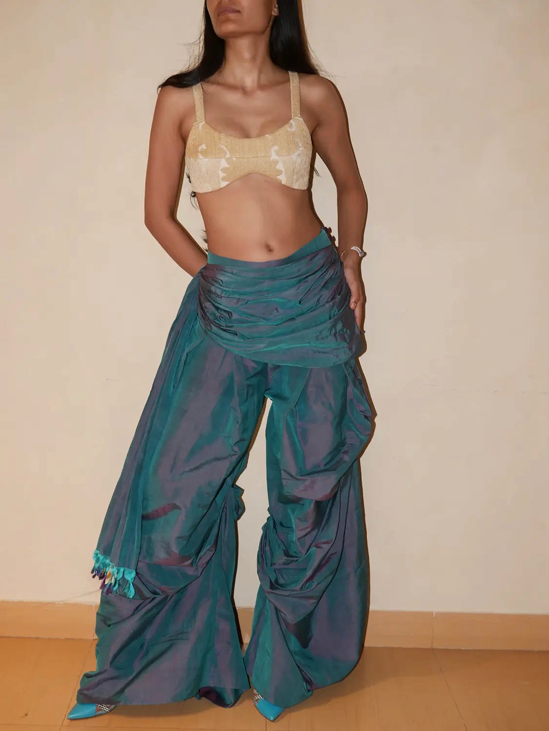 Antariya is a one of a kind drape pant, handcrafted in house from repurposed pure silk and saree borders. 