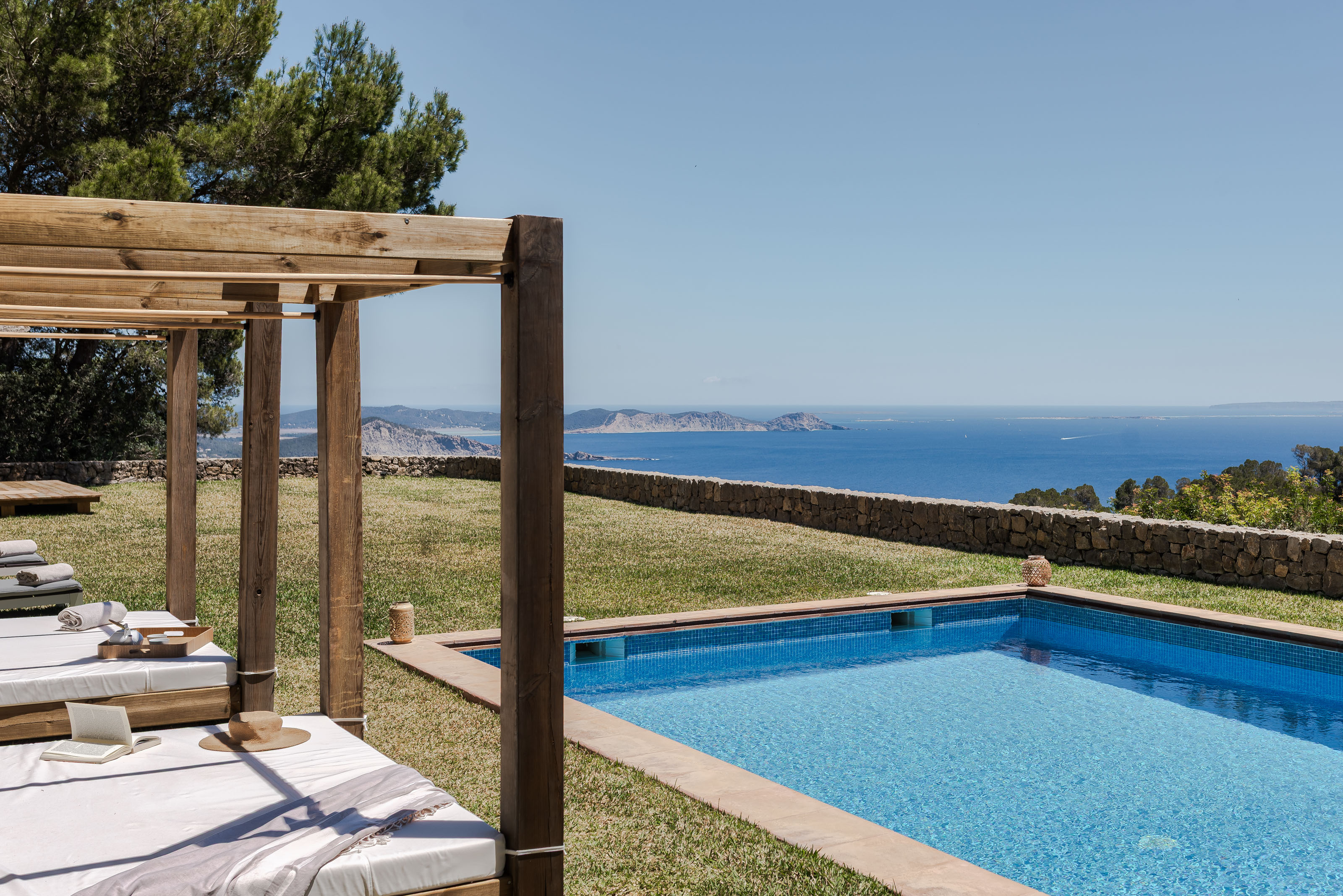 Three men standing in a field
